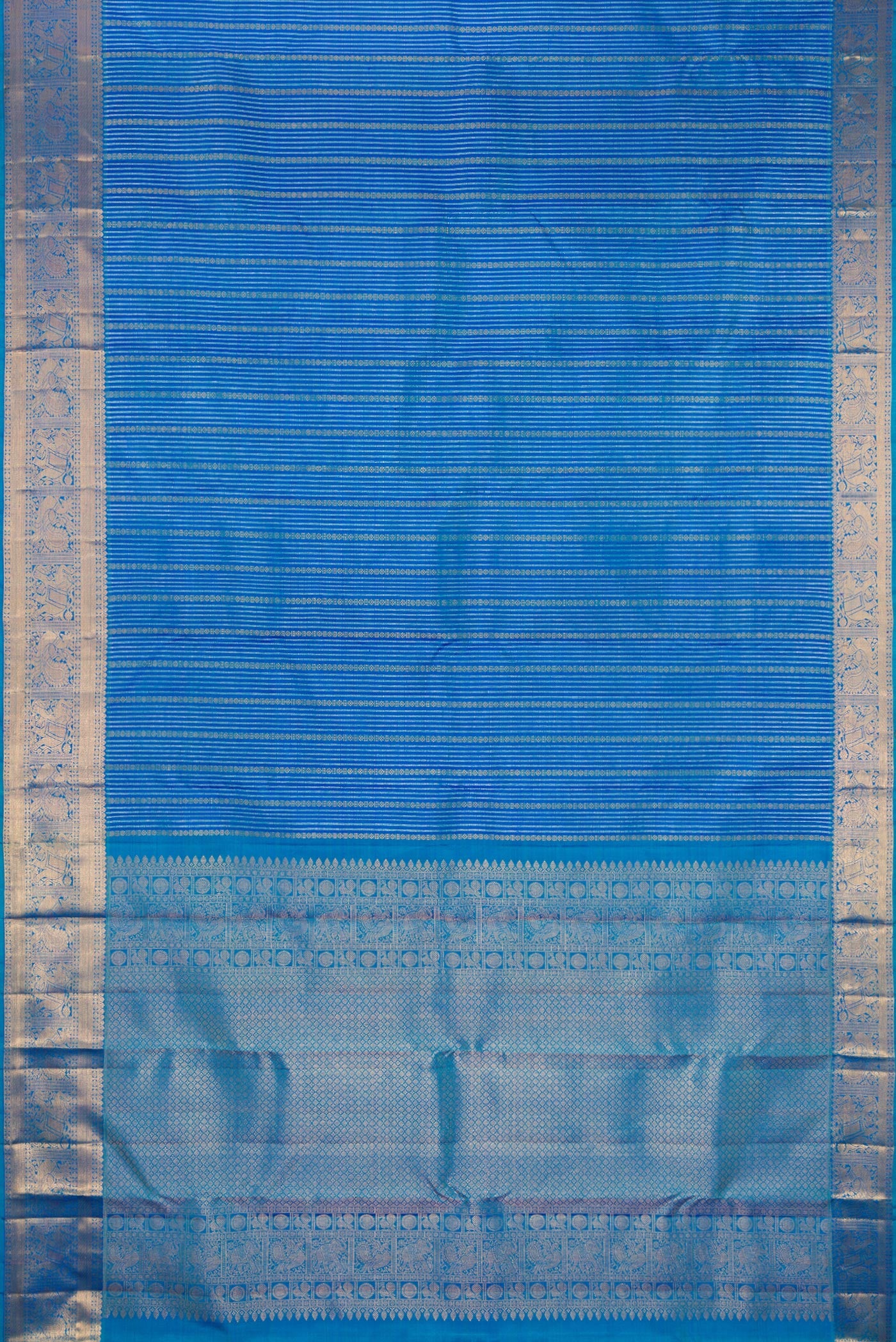 Flat view of Peacock Blue Dual Tone Kanjivaram Silk Saree with Stripes on the body and Zari Border. 