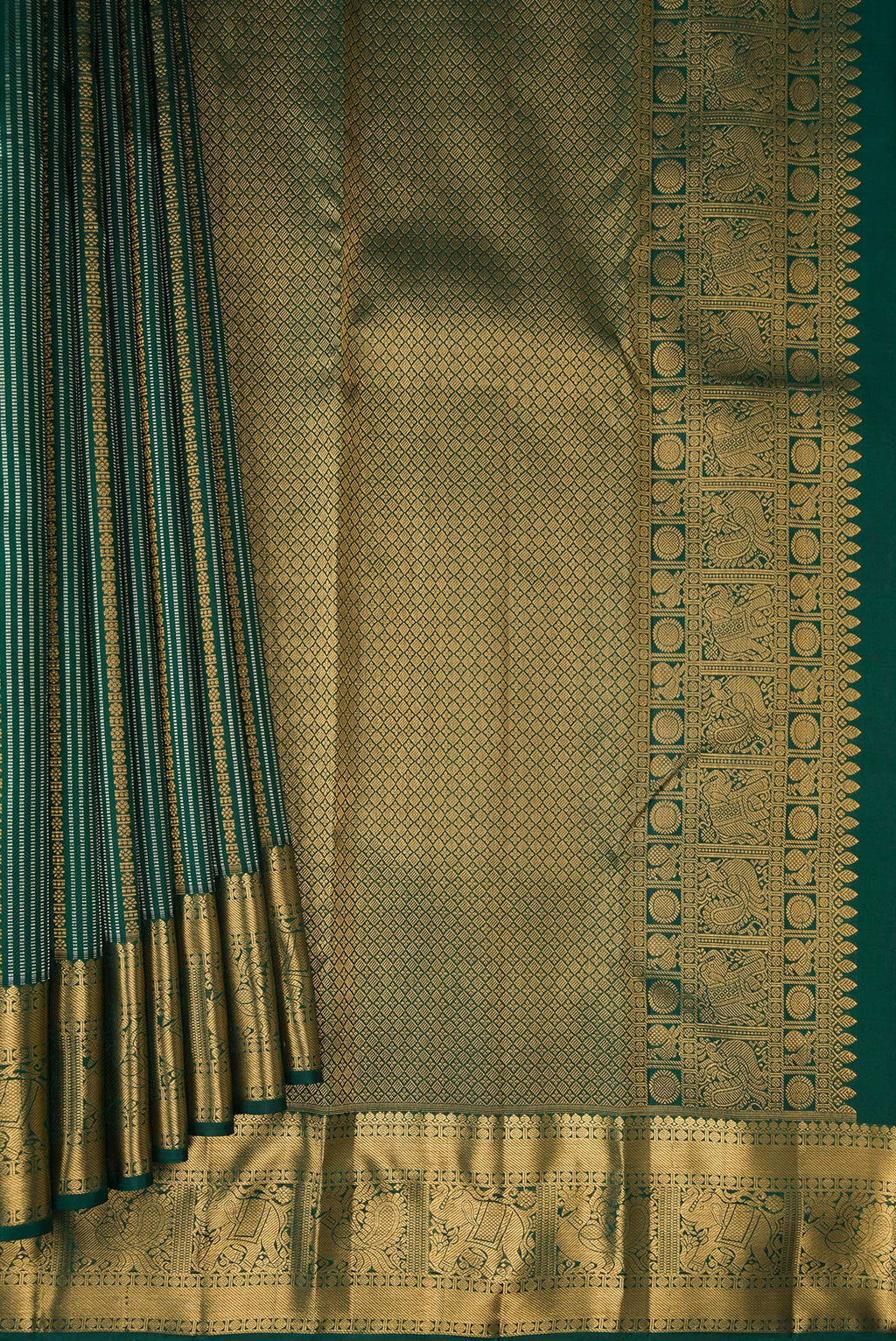 Pleats and pallu of Bottle Green Kanjivaram Silk Saree with Stripes on the body and Fancy Border. 