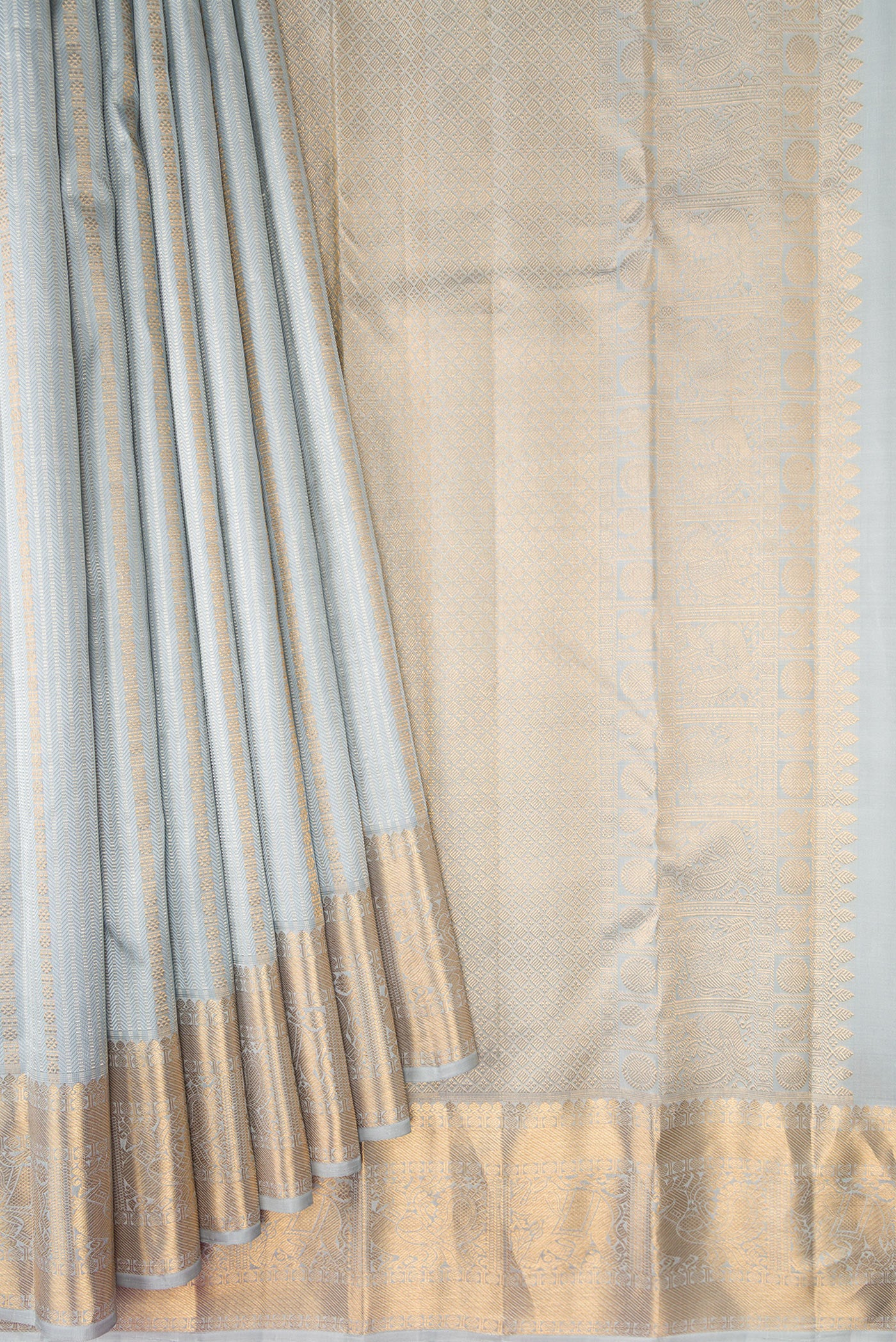 Pleats and pallu of Grey Kanjivaram Silk Saree with Stripes on the body and Zari Border. 