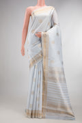 Pure Silk Light Blue Kanjivaram Saree with Zari Butta on the body and Zari Border.  displayed on a mannequin