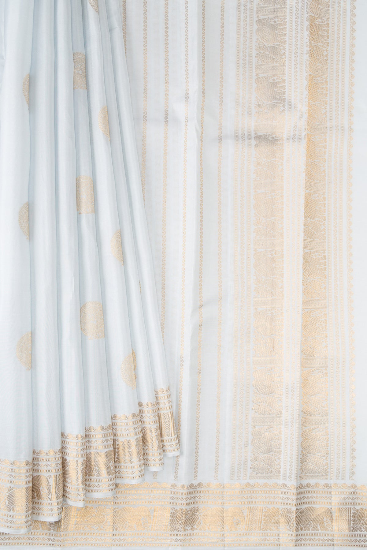 Pleats and pallu of Pure Silk Light Blue Kanjivaram Saree with Zari Butta on the body and Zari Border. 