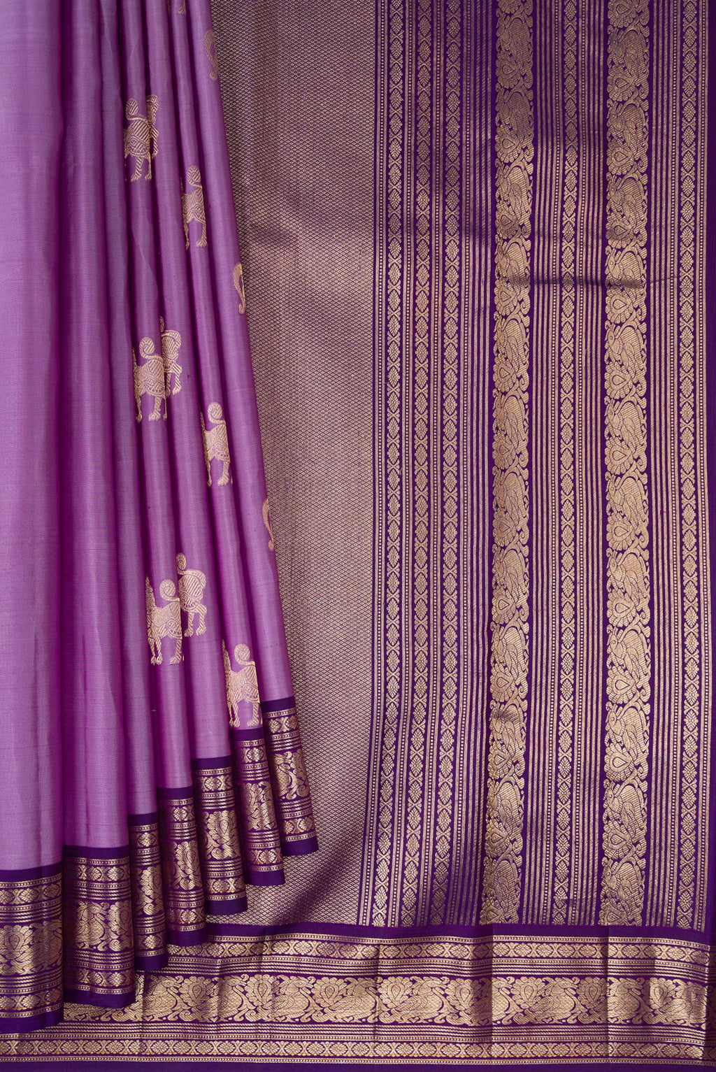 Pleats and pallu of Lavender Kanjivaram Silk Saree with Zari Butta on the body and Zari Border. 