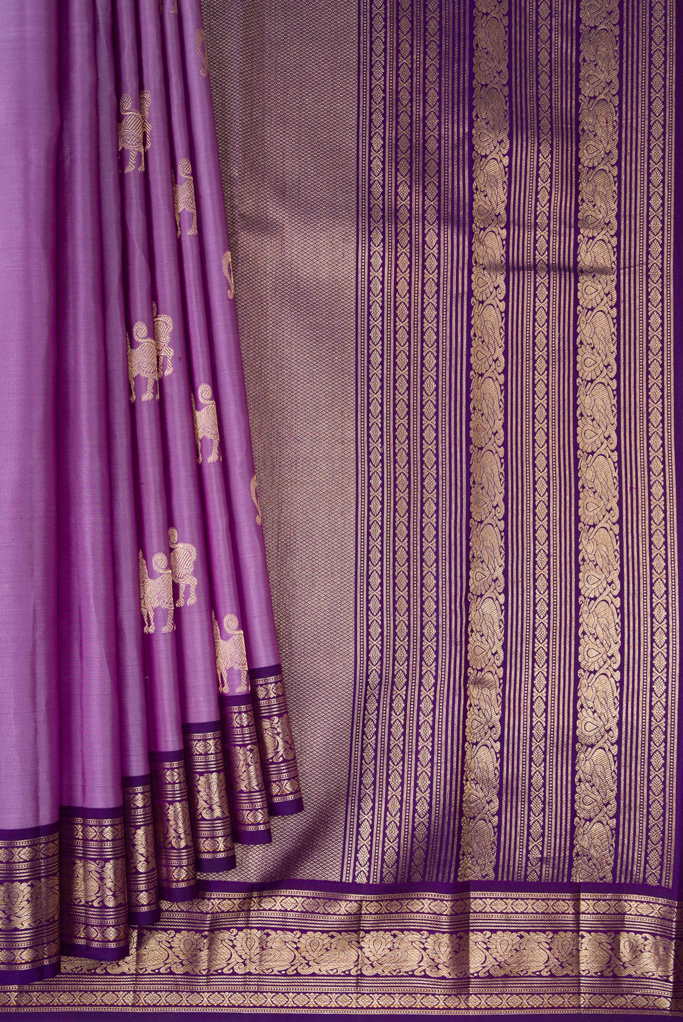 Pleats and pallu of Lavender Kanjivaram Silk Saree with Zari Butta on the body and Zari Border. 