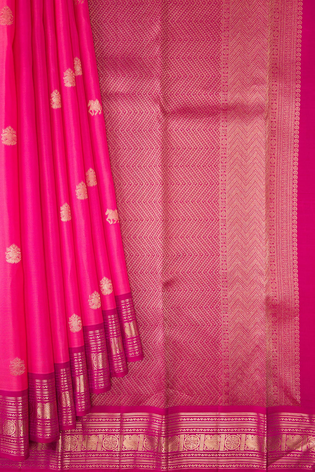 Pleats and pallu of Pink Kanjivaram Silk Saree with Zari Butta on the body and Zari Border. 