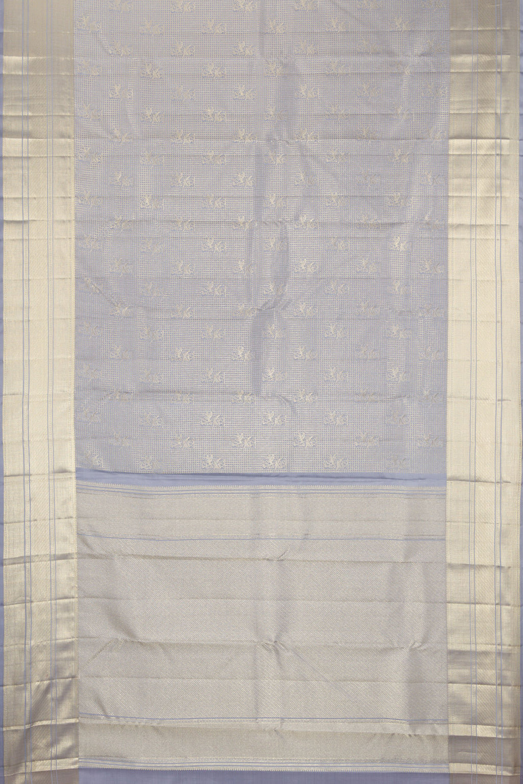 Flat view of Grey Kanchipuram Silk Saree with Zari Brocade on the body and Zari Border. 