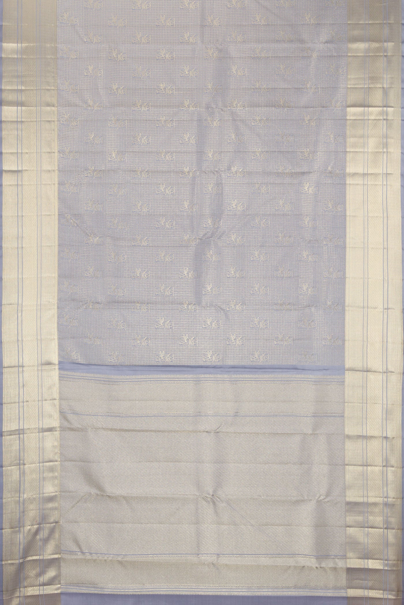 Flat view of Grey Kanchipuram Silk Saree with Zari Brocade on the body and Zari Border. 