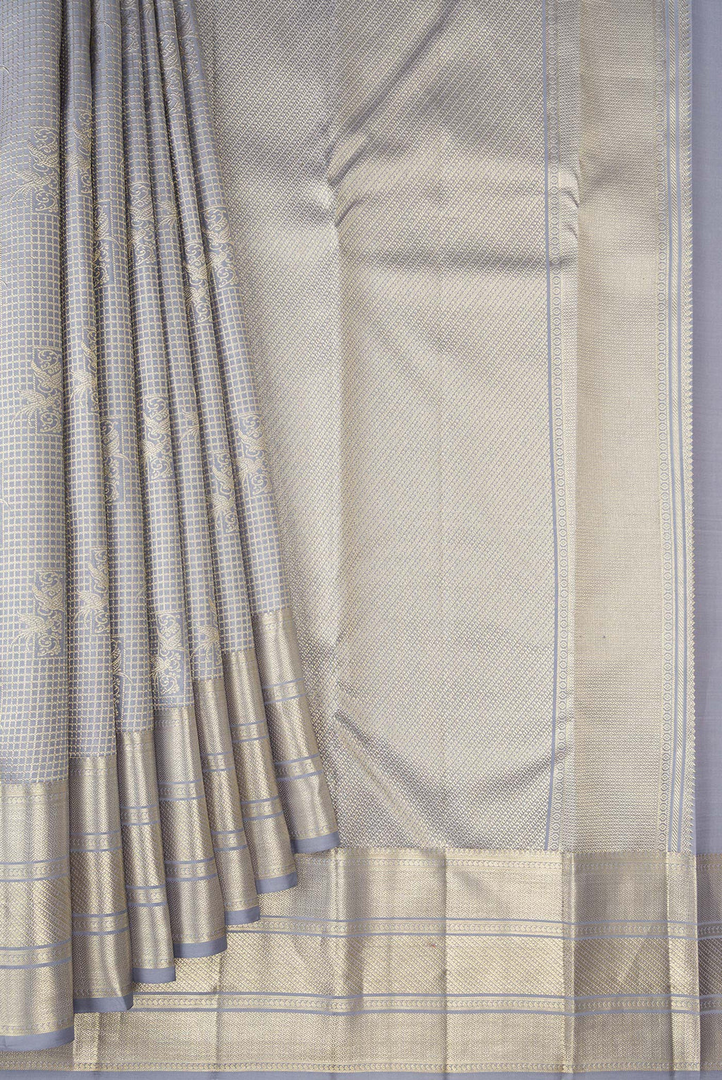 Pleats and pallu of Grey Kanchipuram Silk Saree with Zari Brocade on the body and Zari Border. 