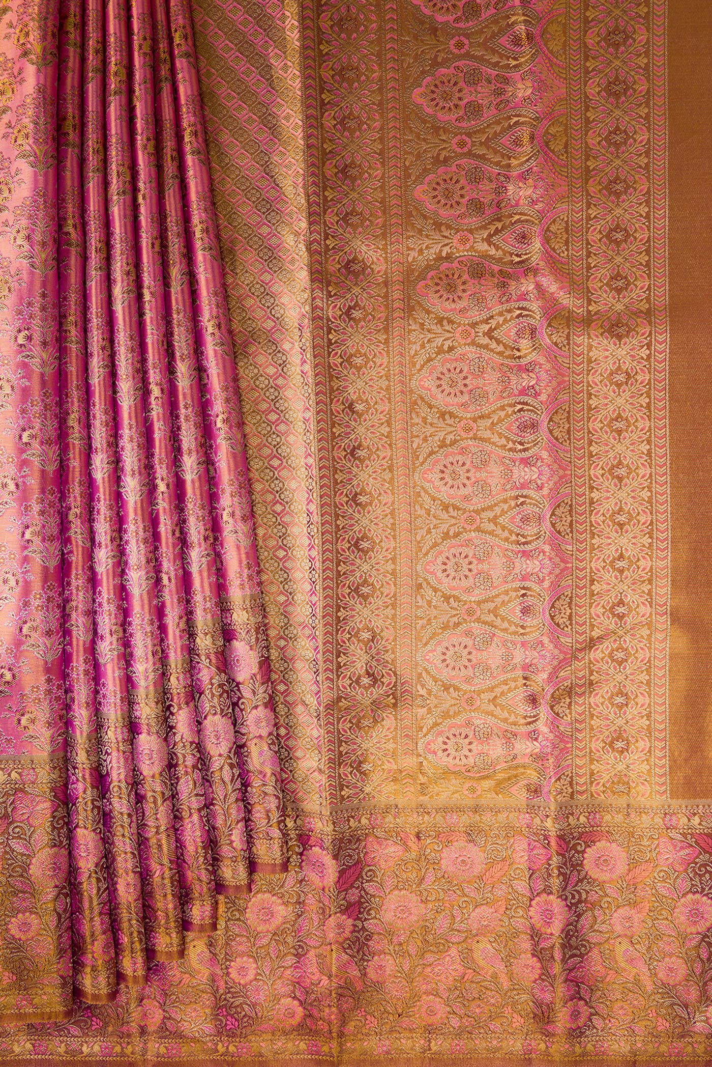 Pleats and pallu of Pink Dual Tone Kanjivaram Tissue Silk Saree with Zari Brocade on the body and Fancy Border. 