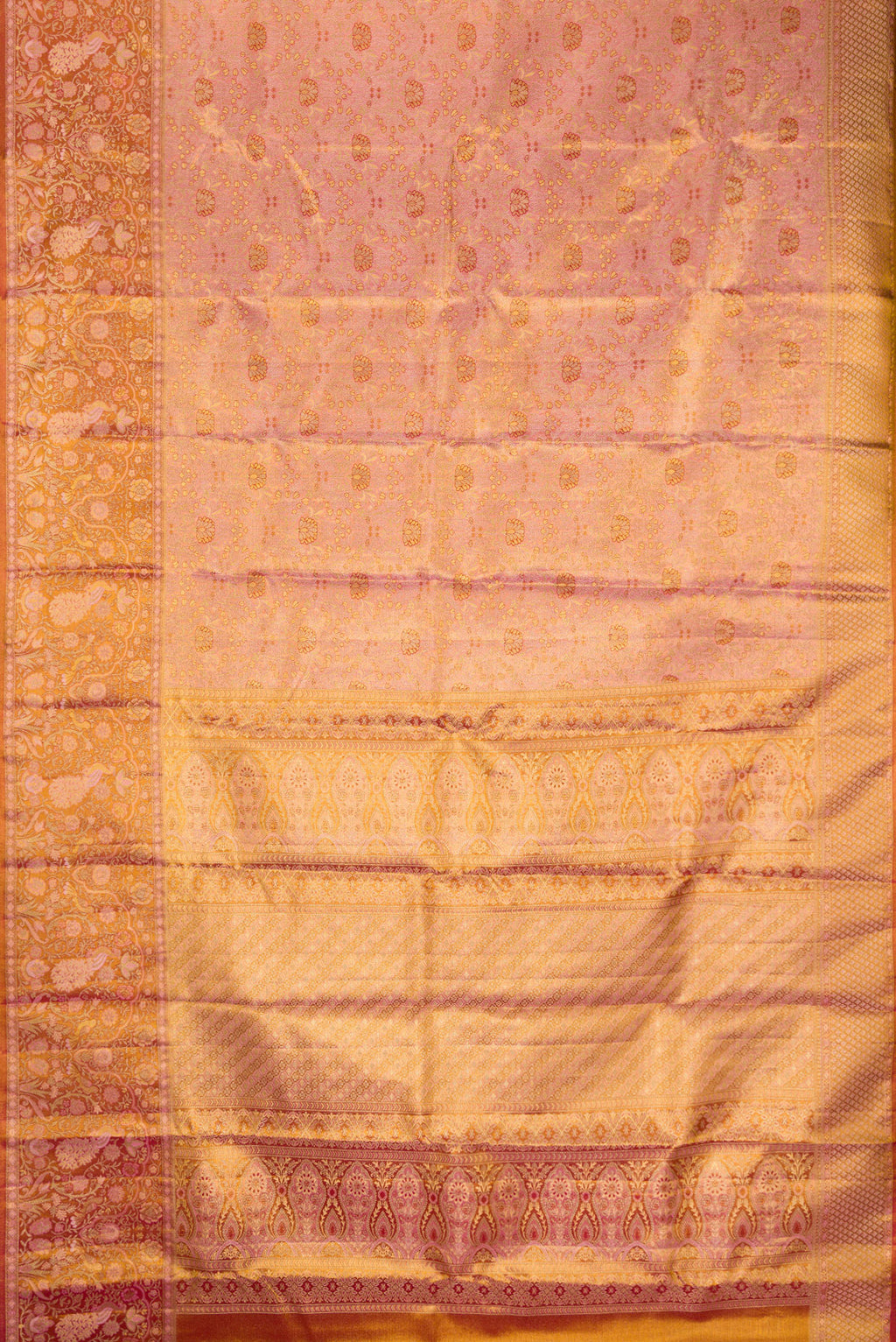 Flat view of Rose Gold Dual Tone Kanjivaram Tissue Silk Saree with Zari Brocade on the body and Fancy Border. 