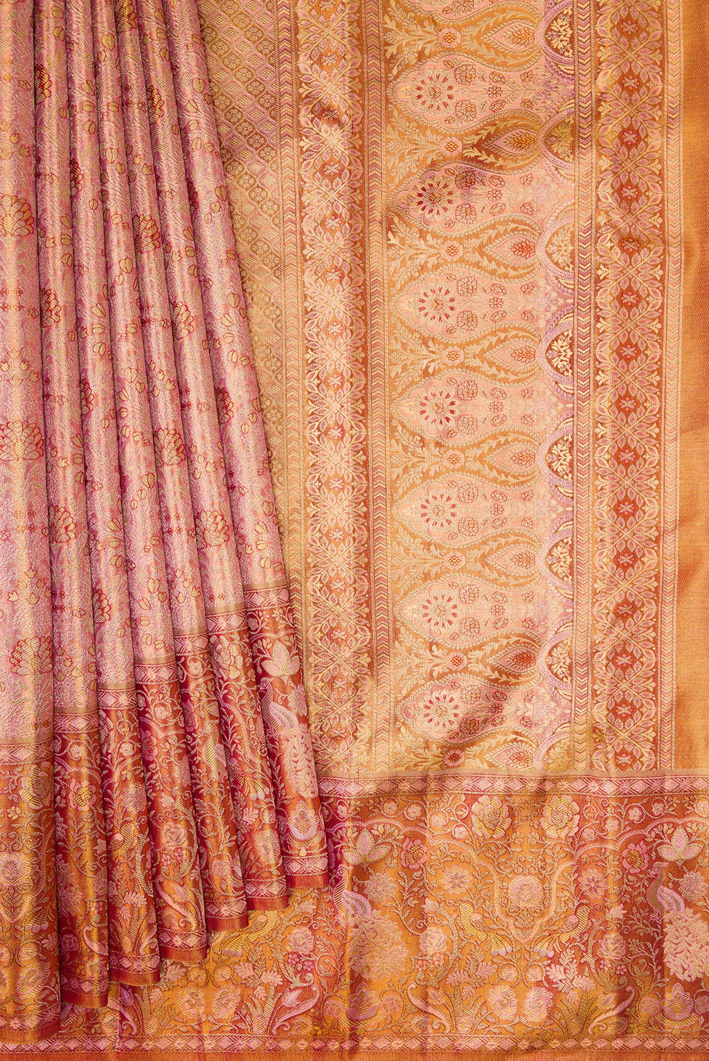 Pleats and pallu of Rose Gold Dual Tone Kanjivaram Tissue Silk Saree with Zari Brocade on the body and Fancy Border. 