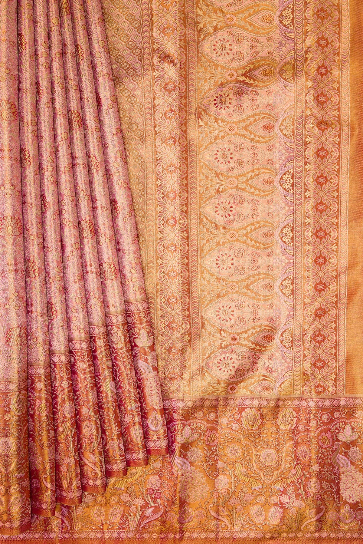 Pleats and pallu of Rose Gold Dual Tone Kanjivaram Tissue Silk Saree with Zari Brocade on the body and Fancy Border. 