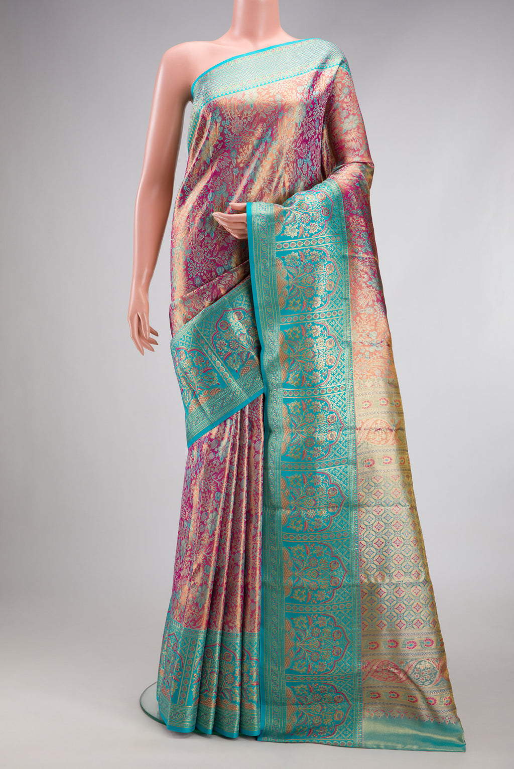 Lavender Dual Tone Kanjivaram Tissue Silk Saree with Zari Brocade on the body and Fancy Border.  displayed on a mannequin