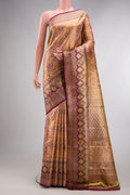 Golden Peach Dual Tone Kanjivaram Tissue Saree with Zari Brocade on the body and Fancy Border.  displayed on a mannequin