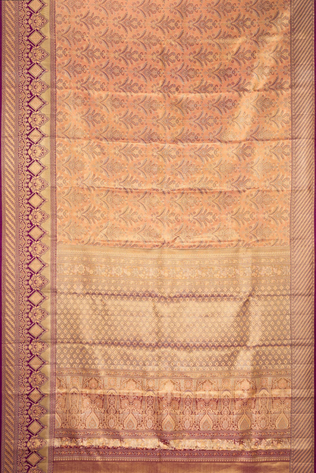 Flat view of Golden Peach Dual Tone Kanjivaram Tissue Saree with Zari Brocade on the body and Fancy Border. 
