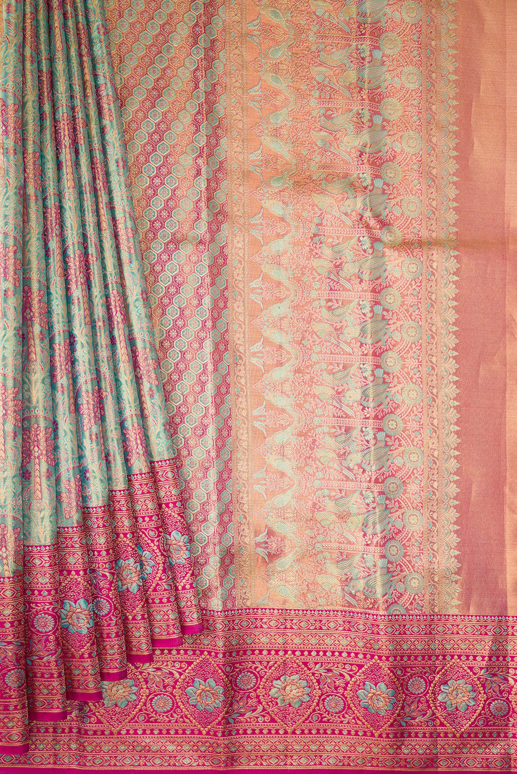 Pleats and pallu of Sea Green Dual Tone Kanjivaram Tissue Saree with Zari Brocade on the body and Fancy Border. 