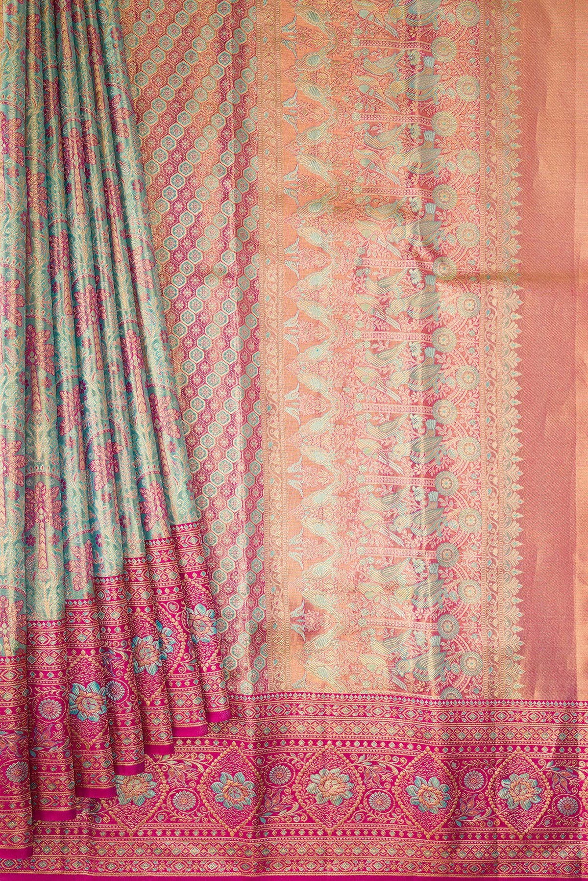 Pleats and pallu of Sea Green Dual Tone Kanjivaram Tissue Saree with Zari Brocade on the body and Fancy Border. 