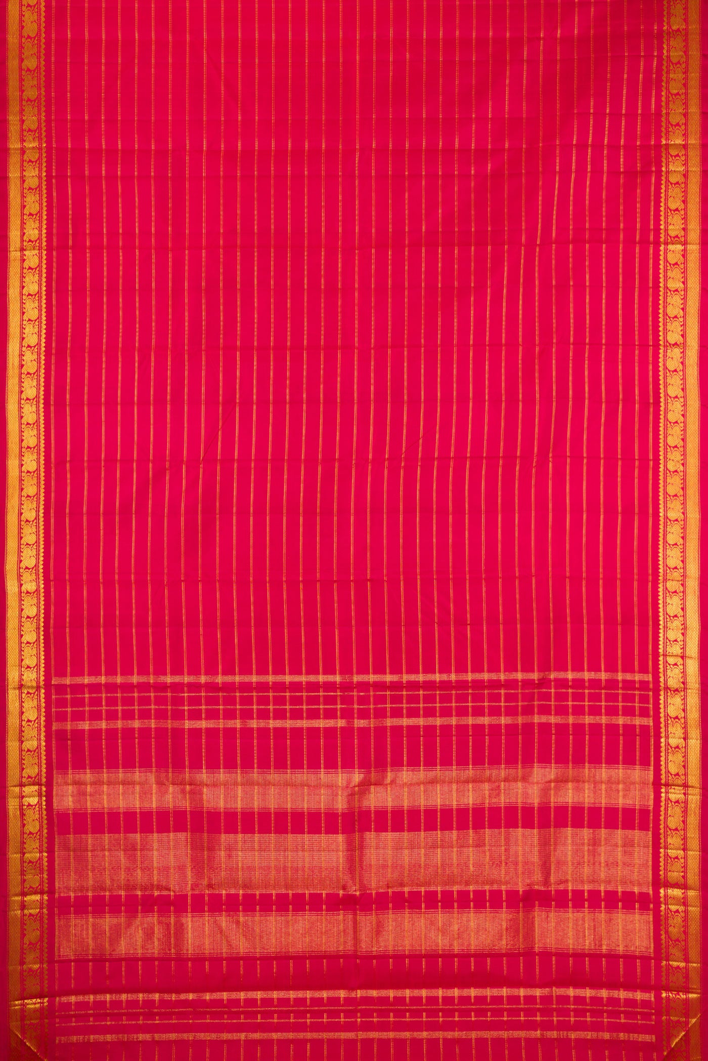 Flat view of Maroon Kanchipuram Silk Saree with Stripes on the body and Zari Border. 