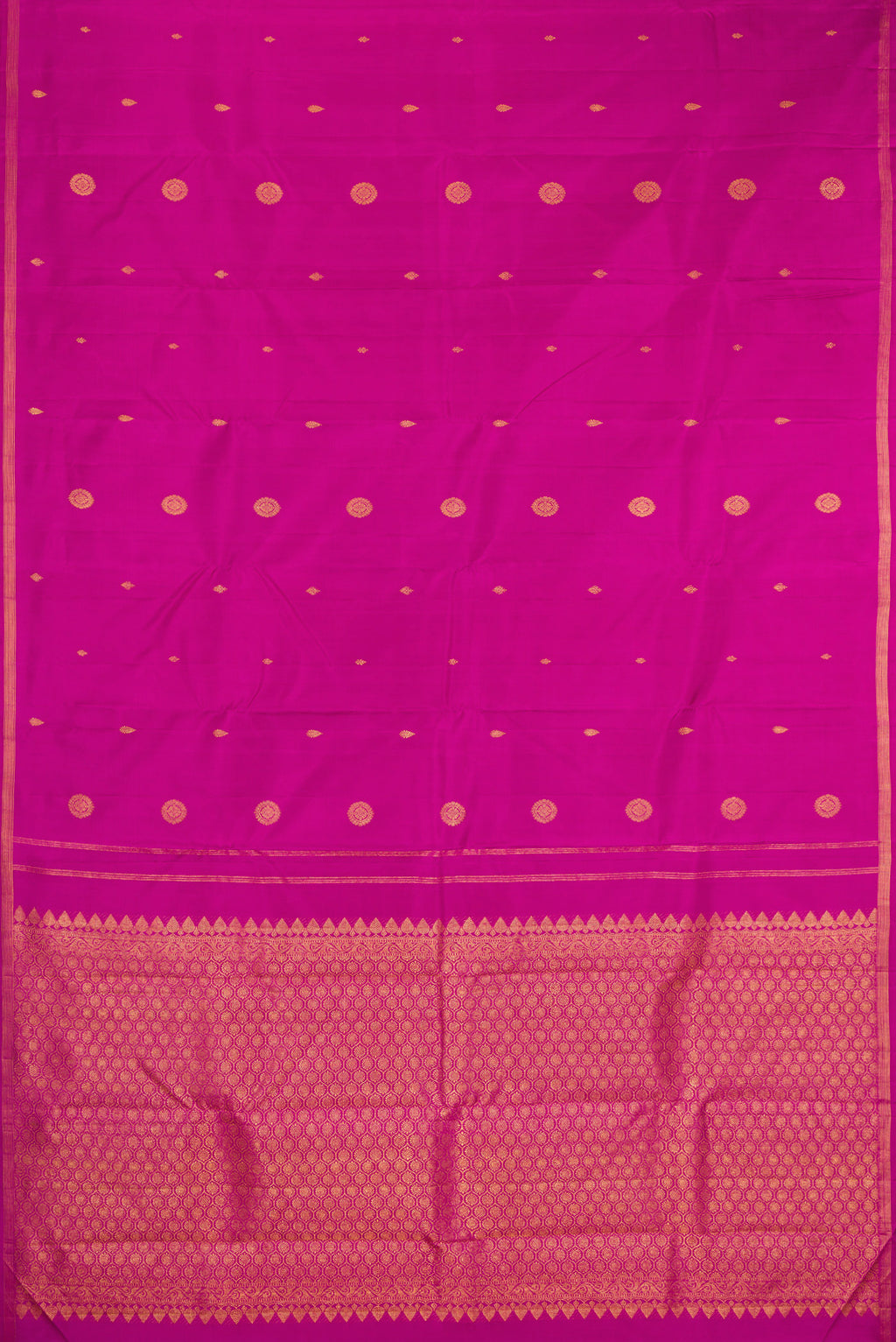 Flat view of Magenta Kanchipuram Silk Saree with Zari Butta on the body and Thin Zari Line. 