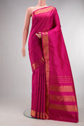 Pure Silk Rani Pink Kanchipuram Saree with Checked design on the body and Zari Border.  displayed on a mannequin
