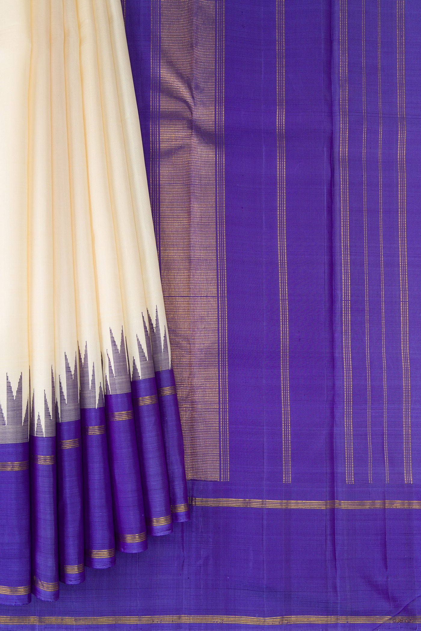 Pleats and pallu of Off White Kanchipuram Silk Saree with Plain Body and Temple Border. 