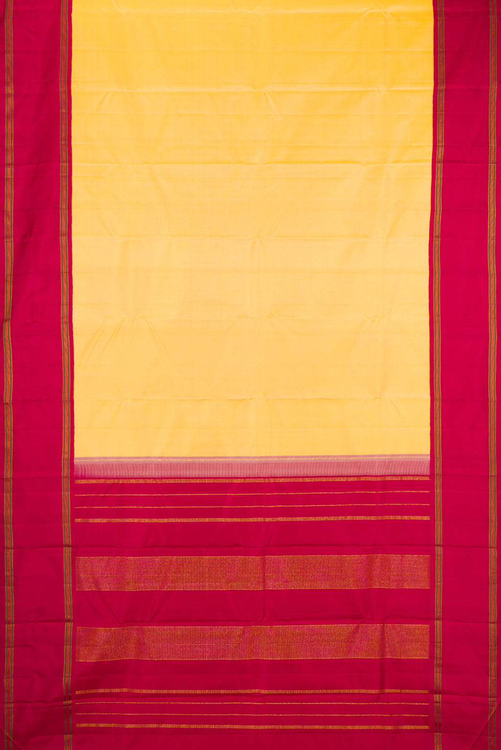 Flat view of Yellow Kanchipuram Silk Saree with Plain Body and Plain Border. 