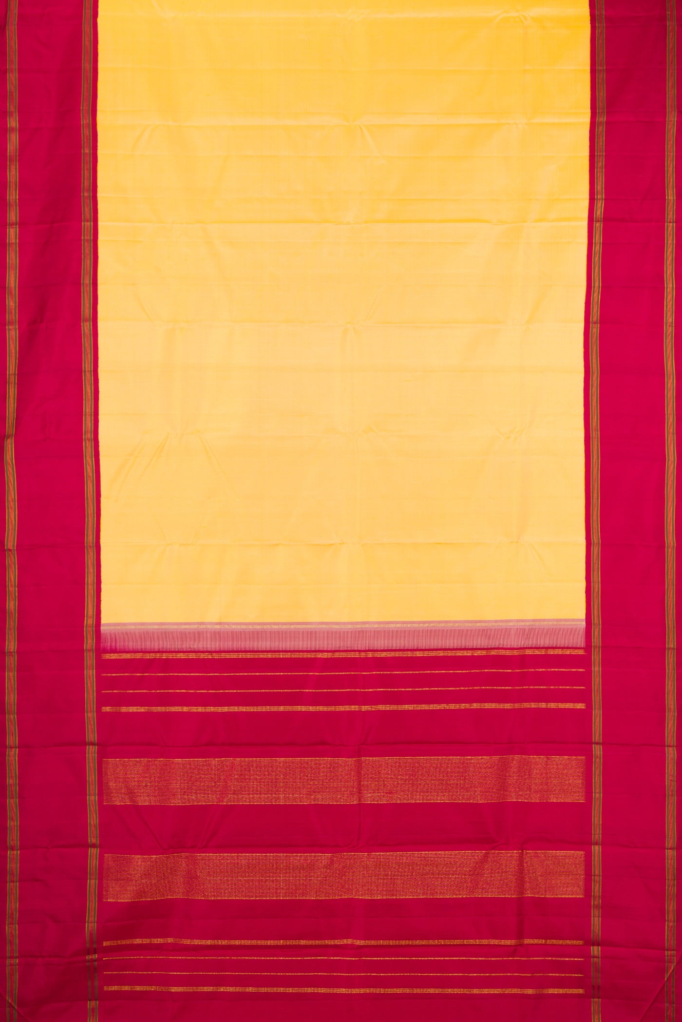 Flat view of Yellow Kanchipuram Silk Saree with Plain Body and Plain Border. 