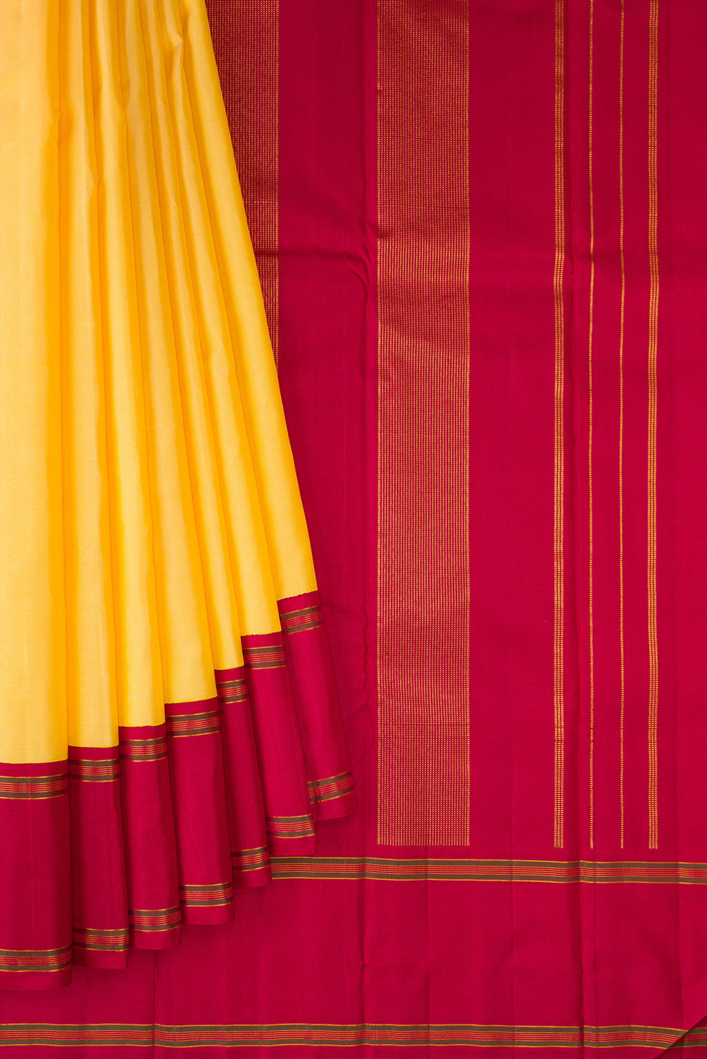 Pleats and pallu of Yellow Kanchipuram Silk Saree with Plain Body and Plain Border. 