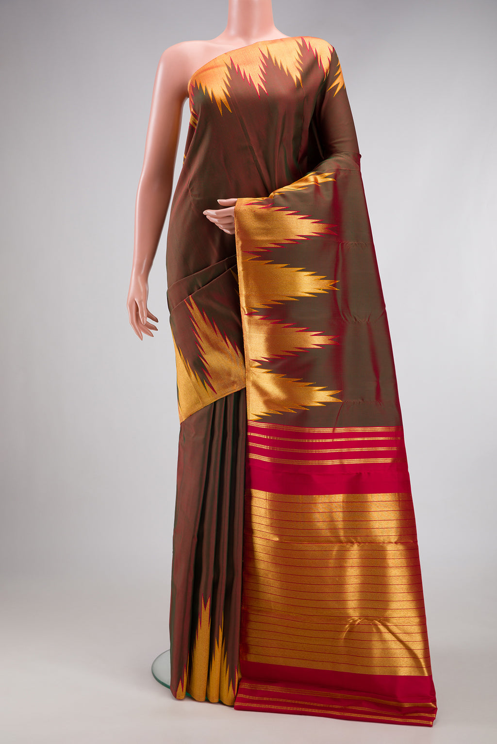 Mehandi Green Dual Tone Kanjivaram Silk Saree with Plain Body and Temple Border.  displayed on a mannequin