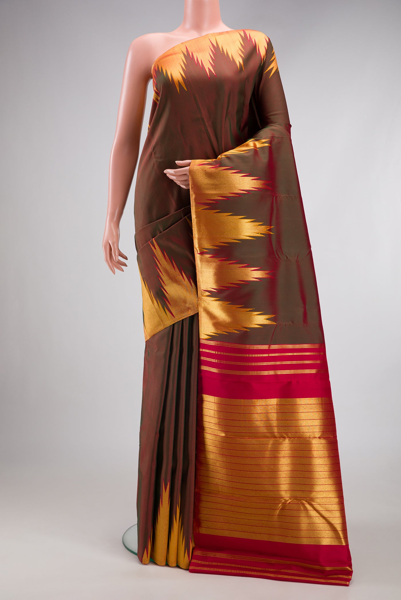 Mehandi Green Dual Tone Kanjivaram Silk Saree with Plain Body and Temple Border.  displayed on a mannequin