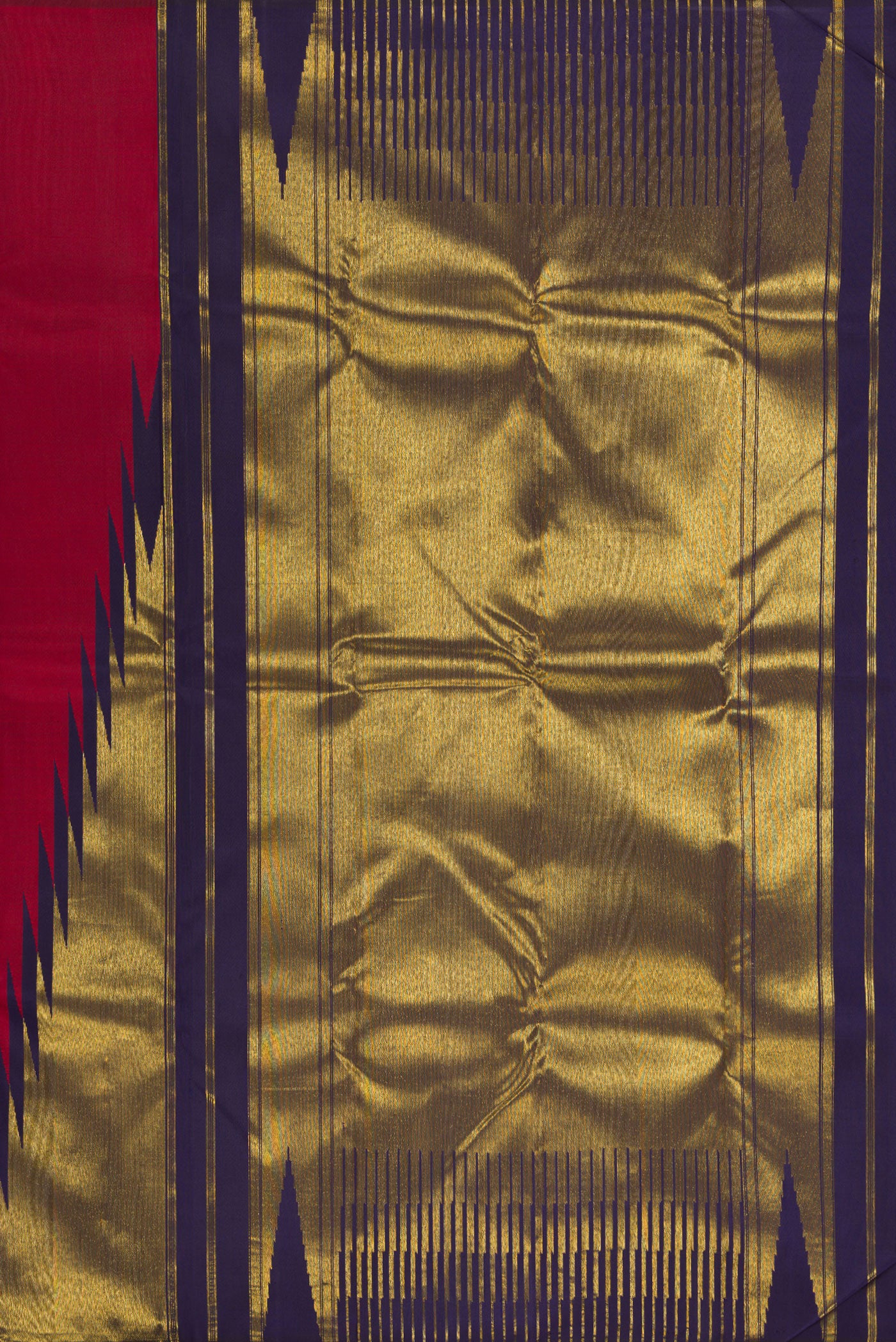 Close up image of the pallu of Maroon Kanjivaram Silk Saree with Plain Body and Temple Border. 