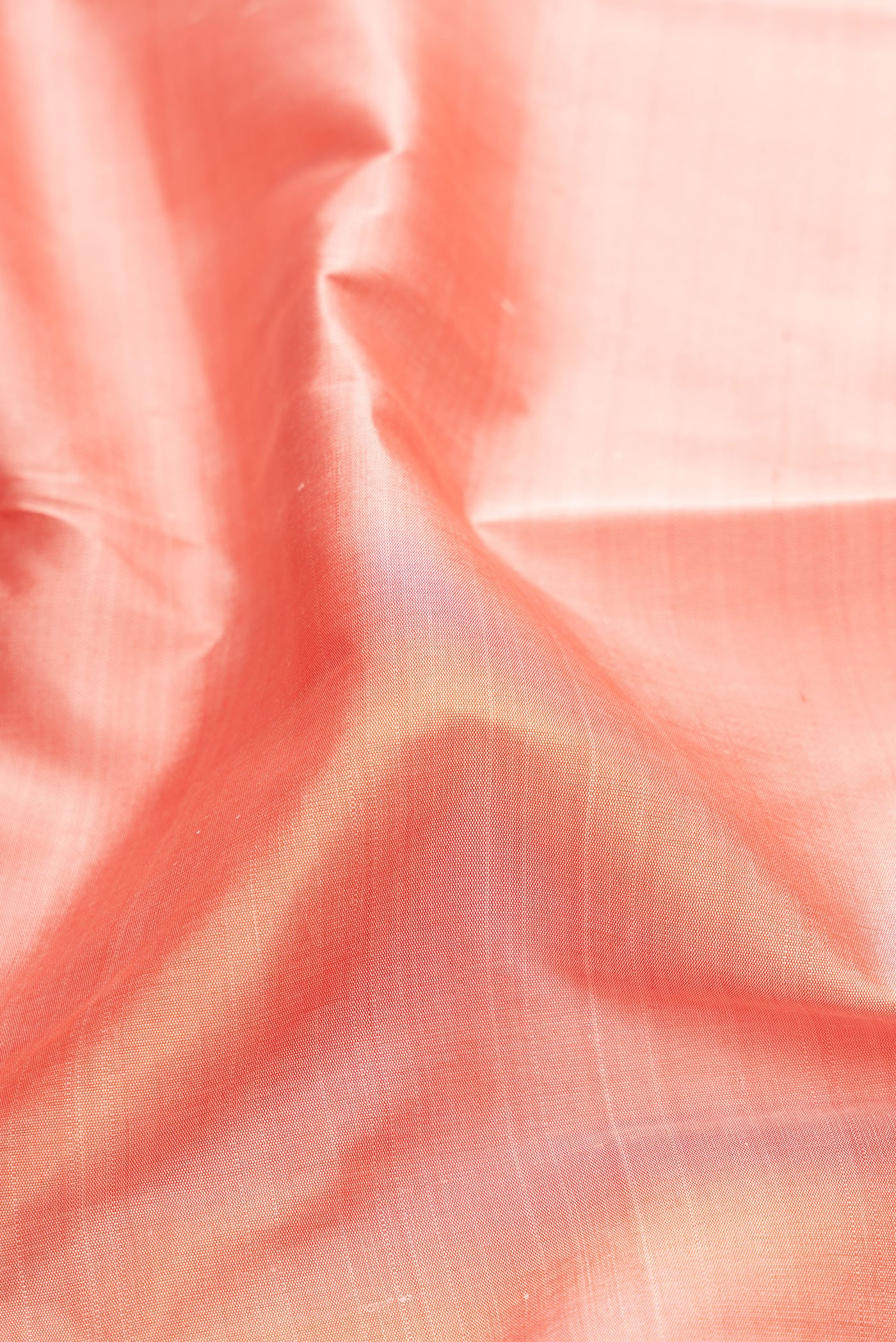 Close up of Rose pink Kanjivaram Silk Saree with Plain Body and Temple Border.  displaying folds