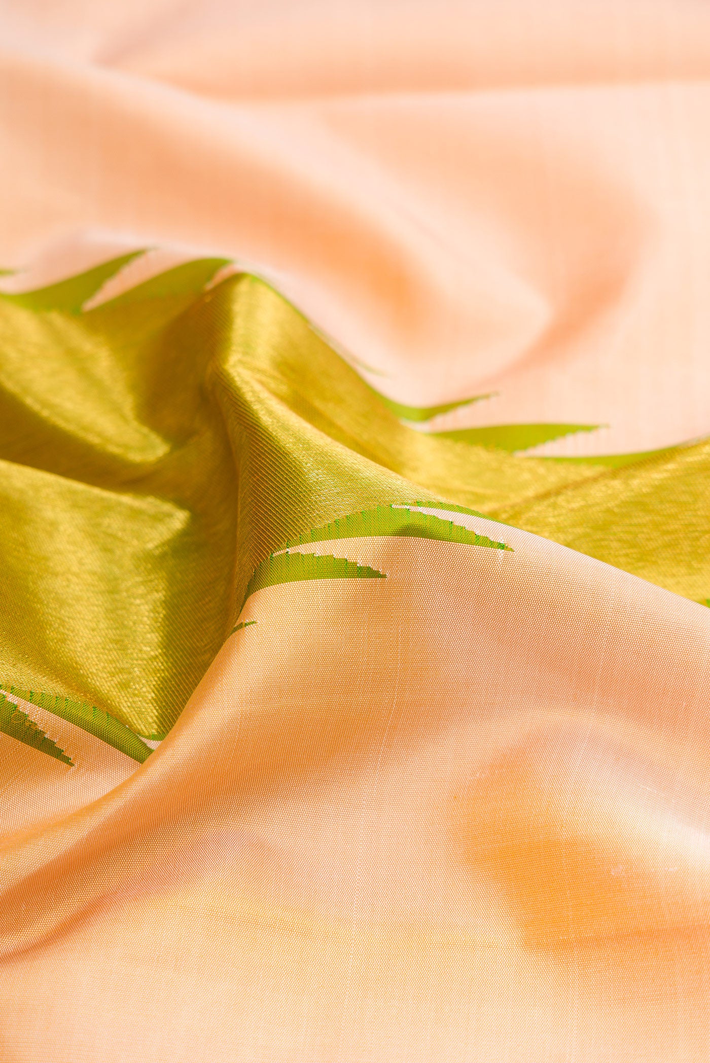 Close up of Sandal Kanjivaram Silk Saree with Plain Body and Temple Border.  displaying folds