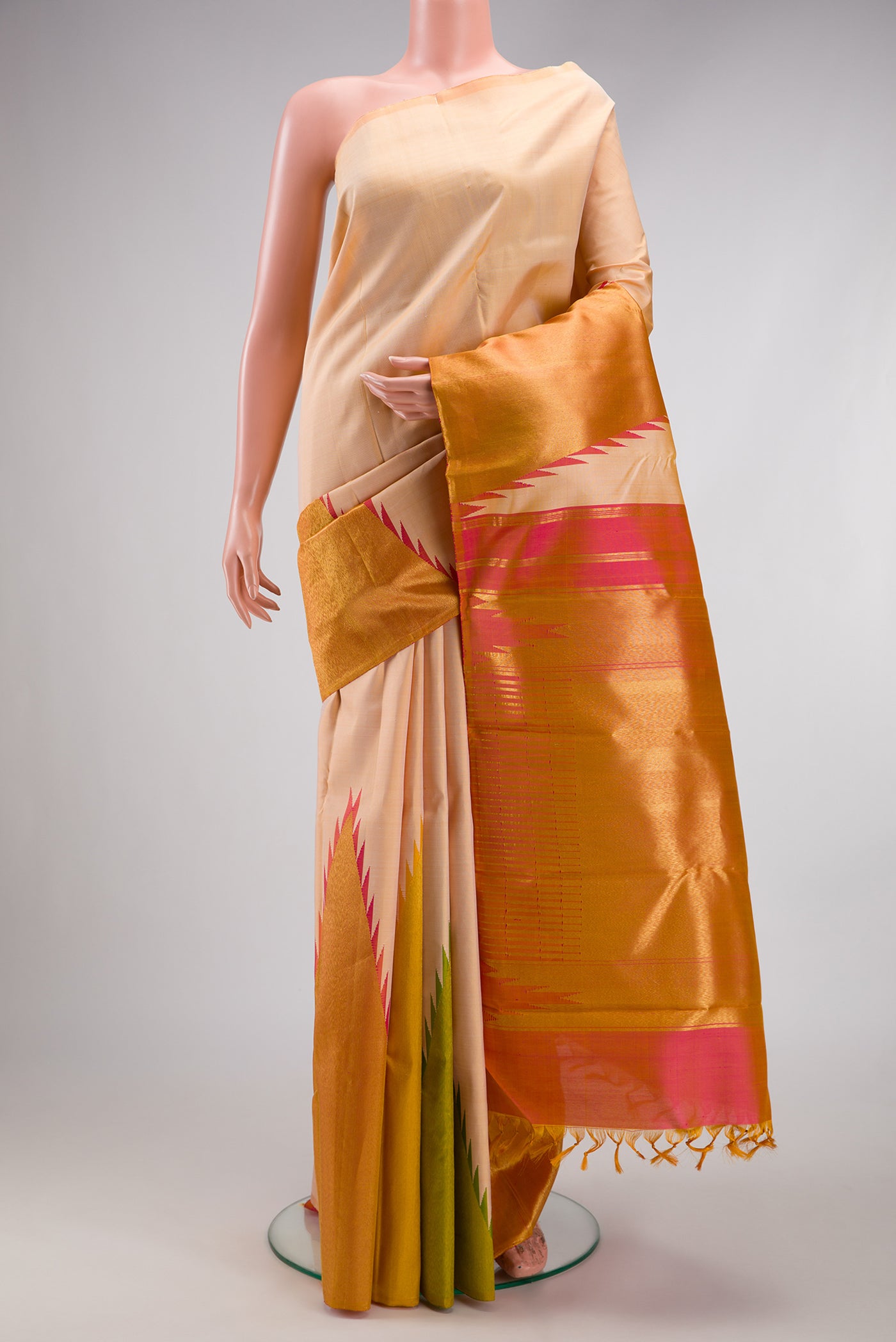 Sandal Kanjivaram Silk Saree with Plain Body and Temple Border.  displayed on a mannequin