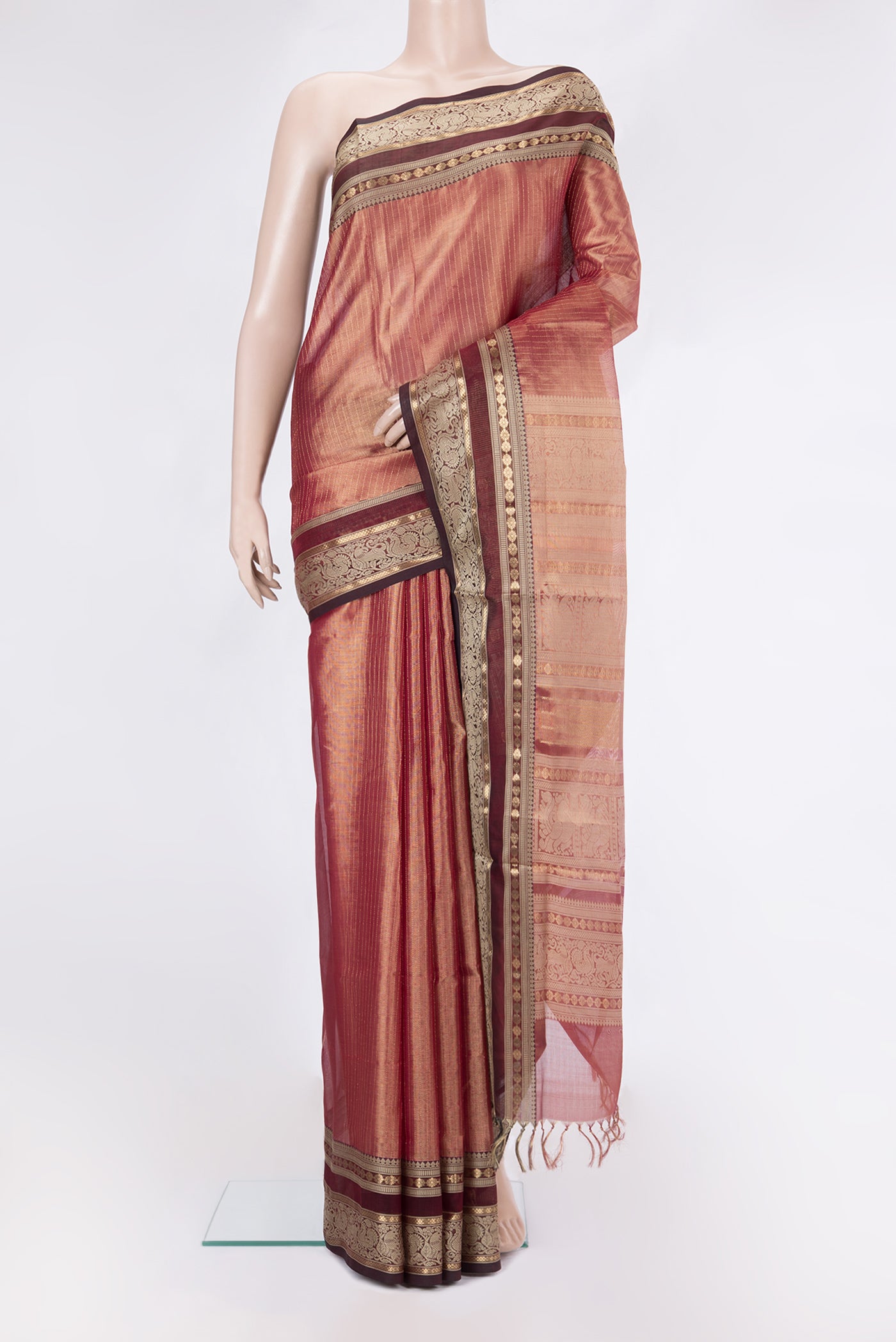 Maroon Dual Tone Silk Cotton Saree with Stripes on the body and Zari And Thread Border.  displayed on a mannequin