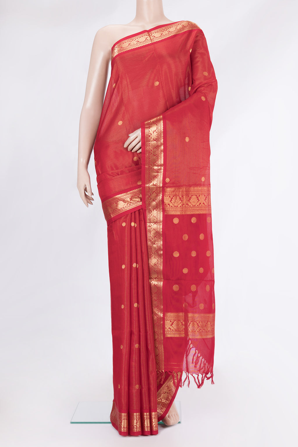 Red Silk Cotton Saree with Stripes on the body and Zari Border.  displayed on a mannequin