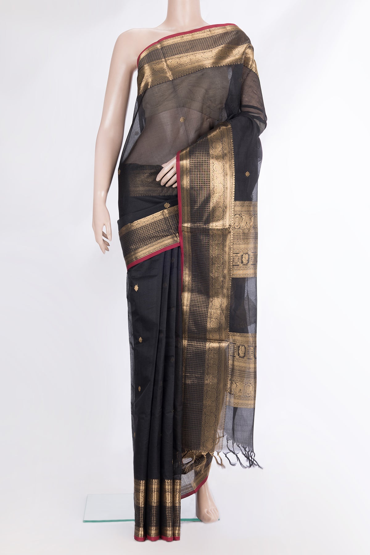 Black Silk Cotton Saree with Zari Butta on the body and Fancy Border.  displayed on a mannequin