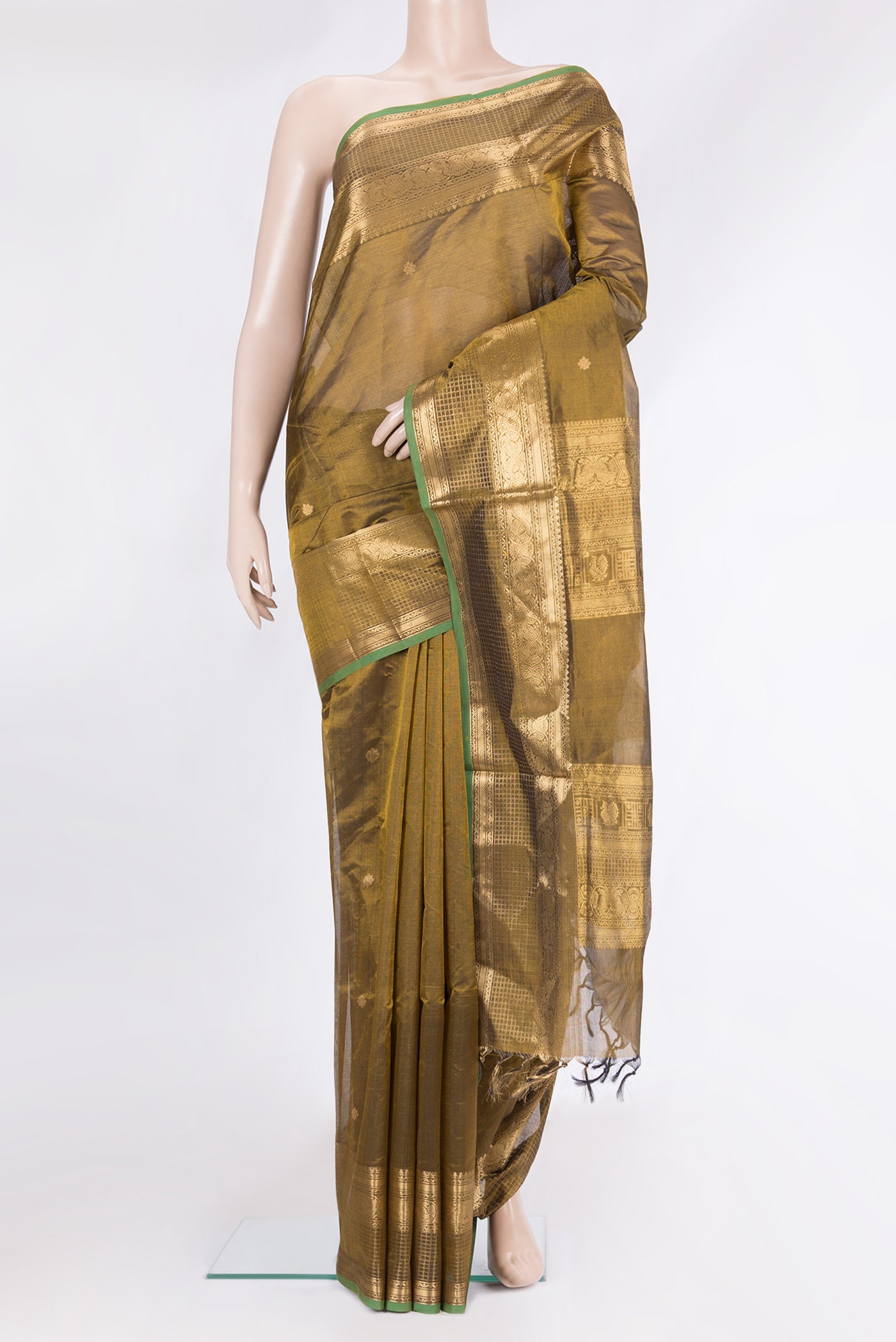 Mehandi Green Silk Cotton Saree with Zari Butta on the body and Zari Border.  displayed on a mannequin