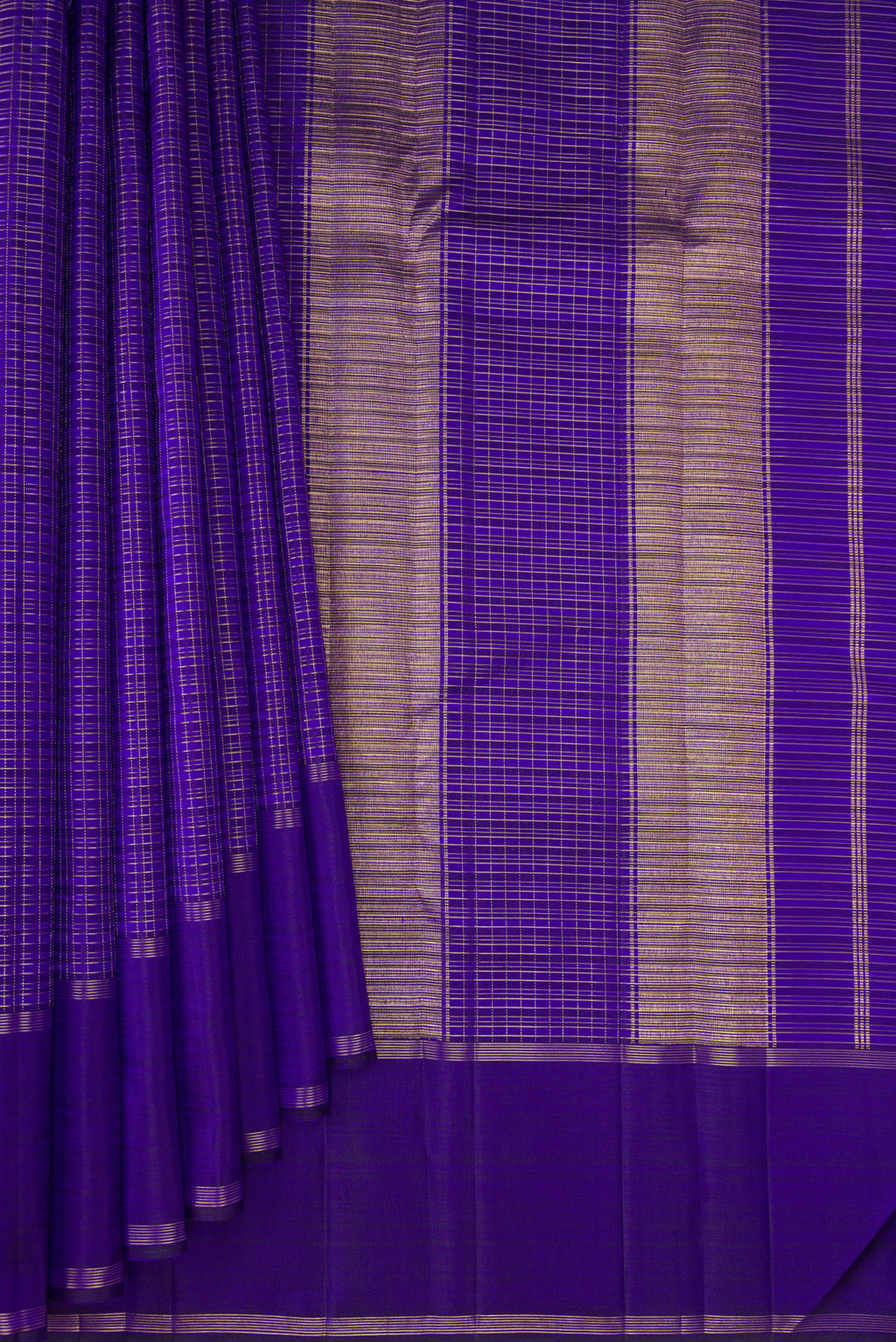 Pleats and pallu of Royal Blue Kanchipuram Silk Saree with Checked design on the body and Zari Border. 