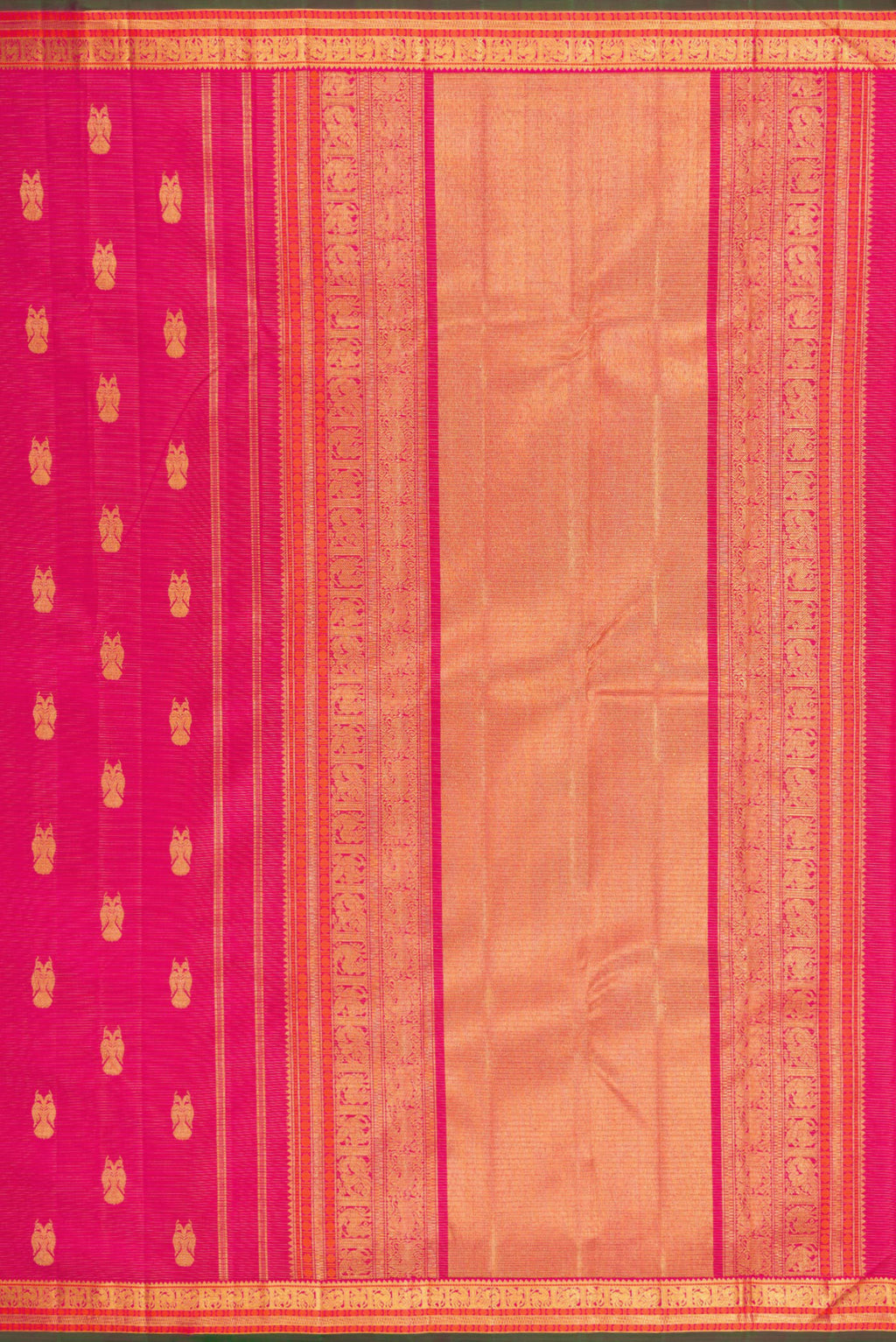 Close up image of the pallu of Pink Kanjivaram Silk Saree with Zari Butta on the body and Zari Border. 