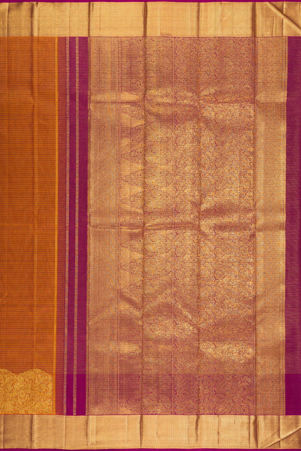 Close up image of the pallu of Rust Kanchipuram Silk Saree with Checked design on the body and Fancy Border. 