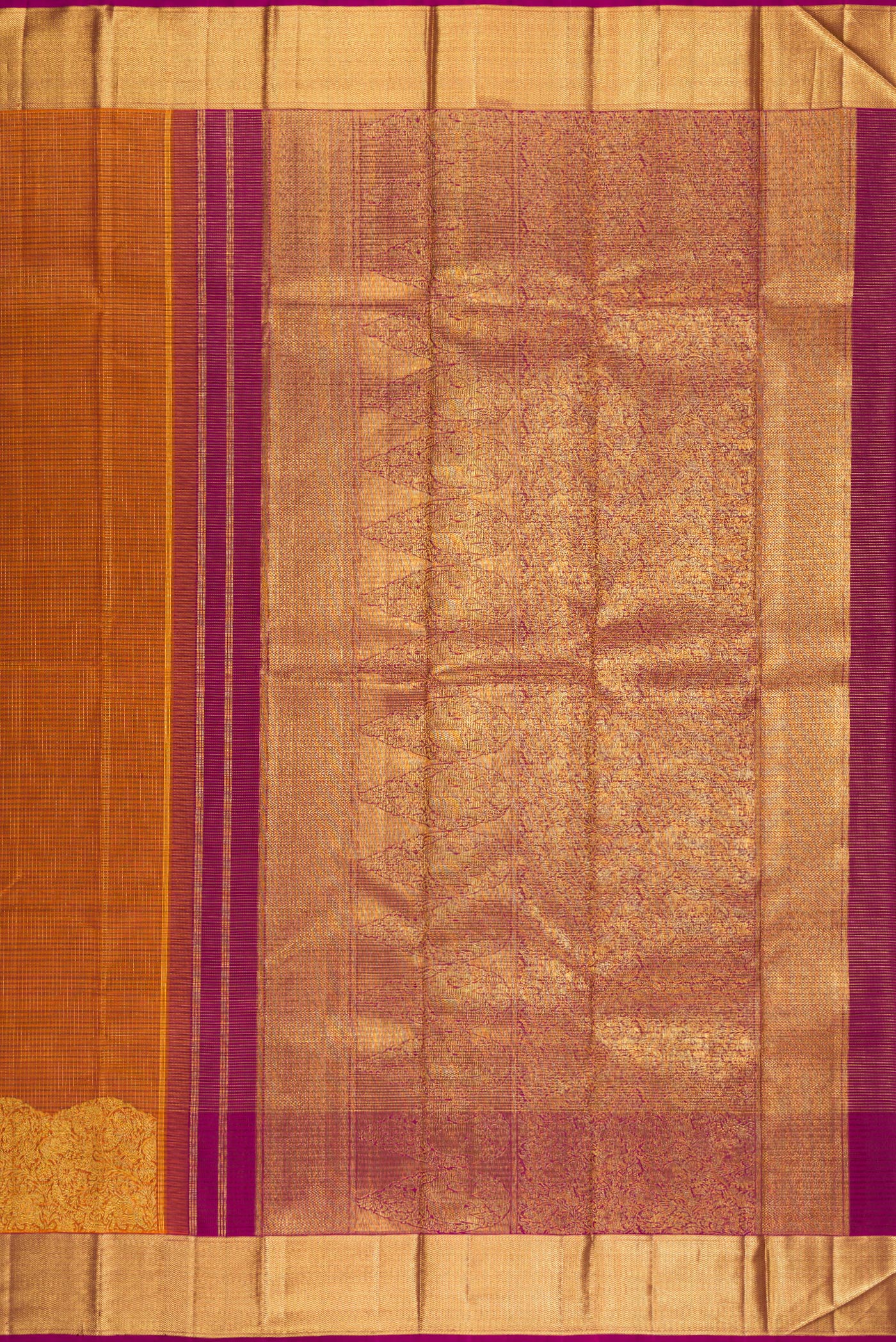 Close up image of the pallu of Rust Kanchipuram Silk Saree with Checked design on the body and Fancy Border. 