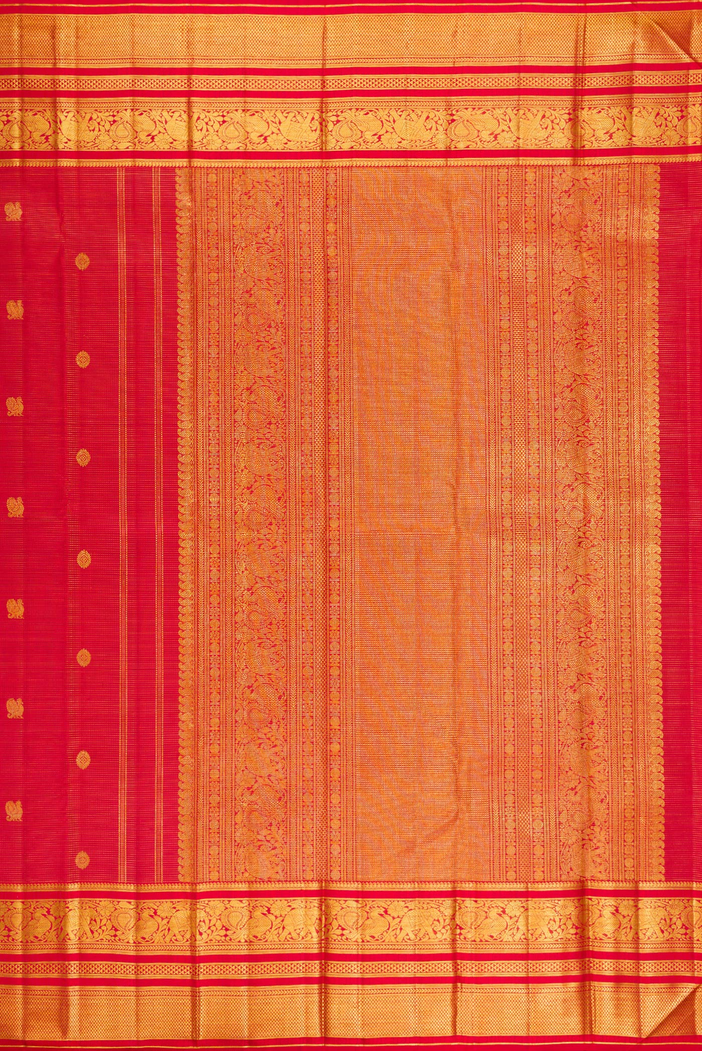 Close up image of the pallu of Red Kanchipuram Silk Saree with Stripes on the body and Zari Border. 