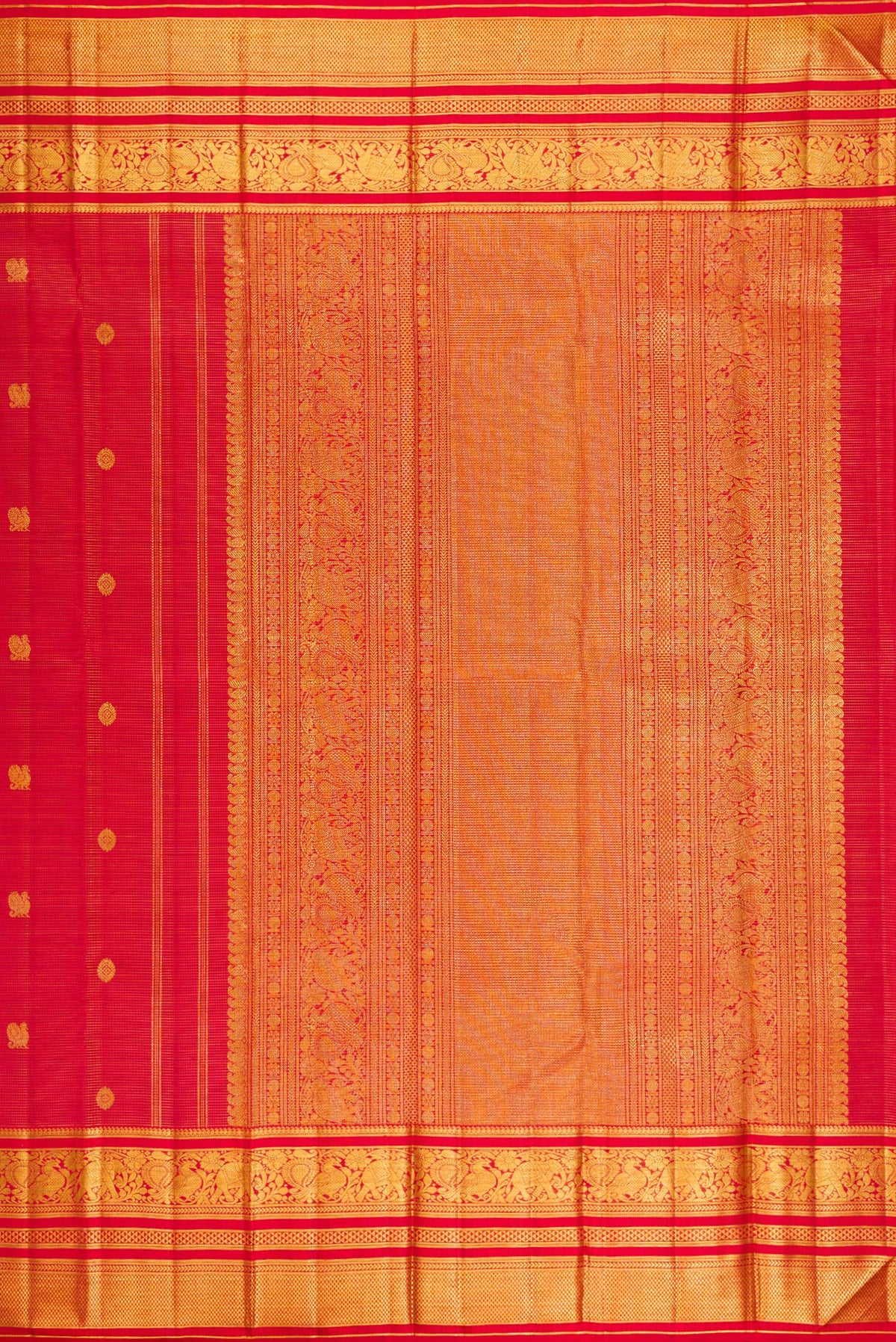 Close up image of the pallu of Red Kanchipuram Silk Saree with Stripes on the body and Zari Border. 