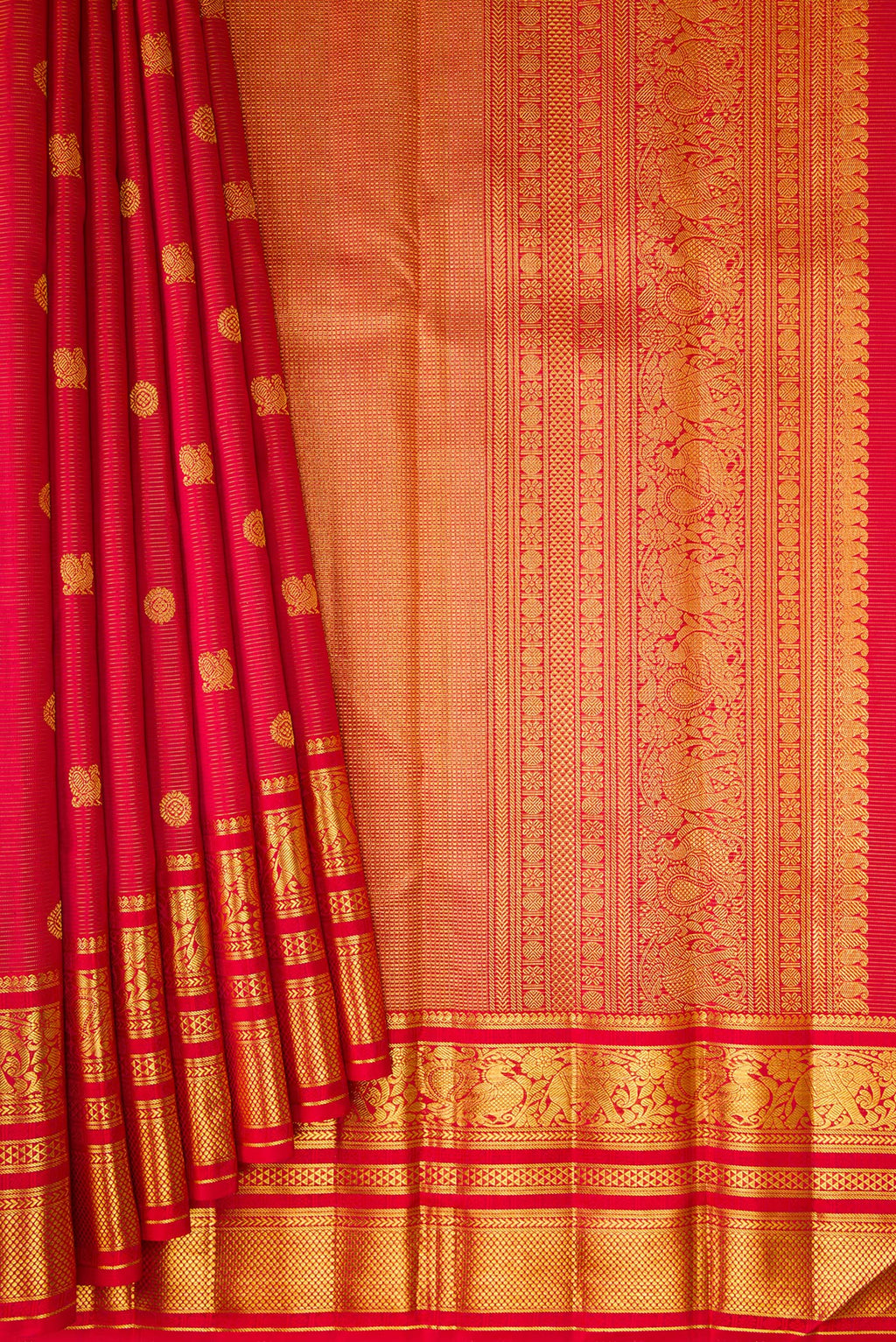 Pleats and pallu of Red Kanchipuram Silk Saree with Stripes on the body and Zari Border. 