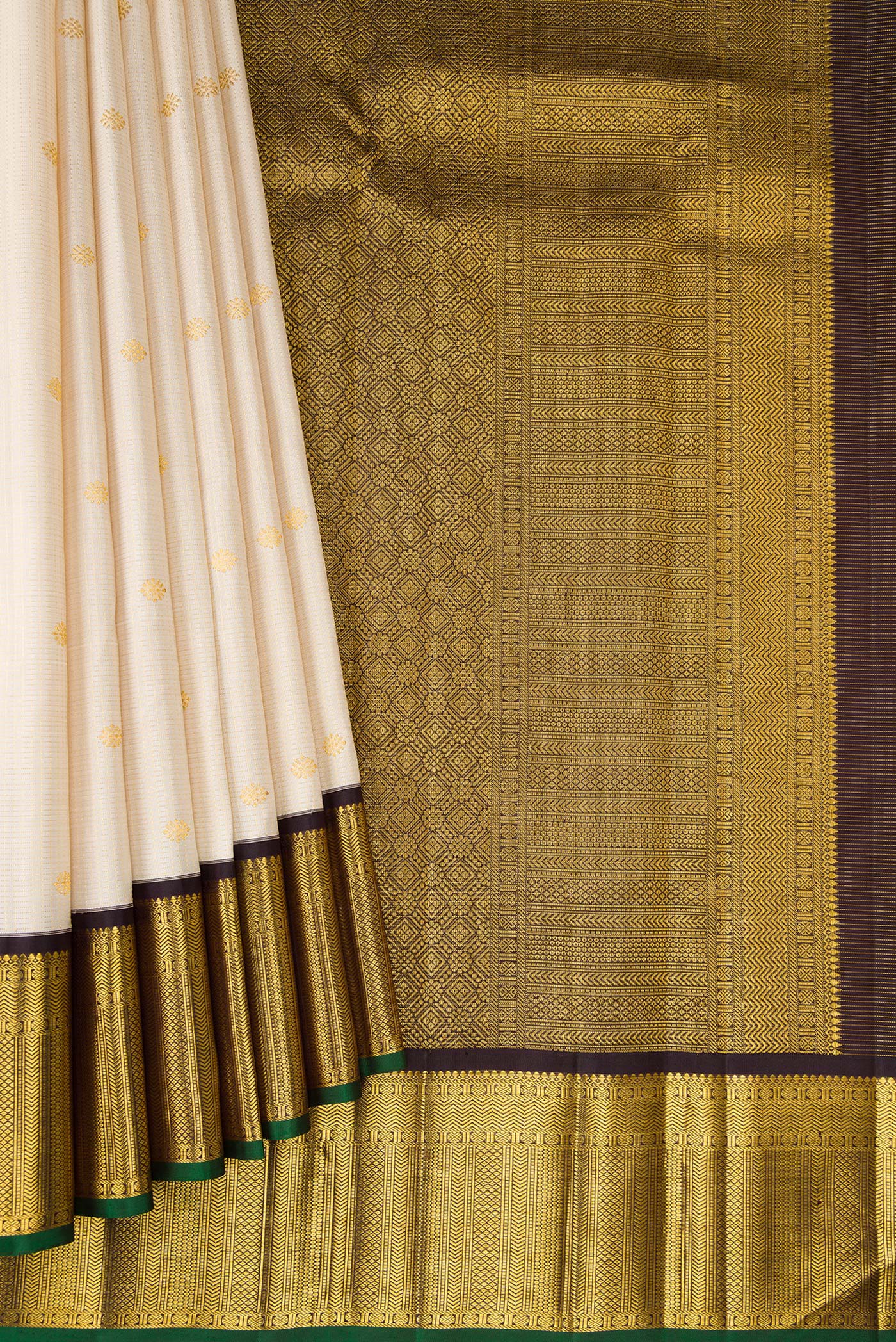 Pleats and pallu of Cream Kanchipuram Silk Saree with Checked design on the body and Zari Border. 