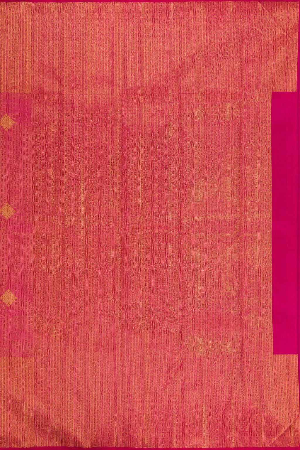 Close up image of the pallu of Pure Silk Dark Pink Kanchipuram Saree with Zari Brocade on the body and Zari Border. 
