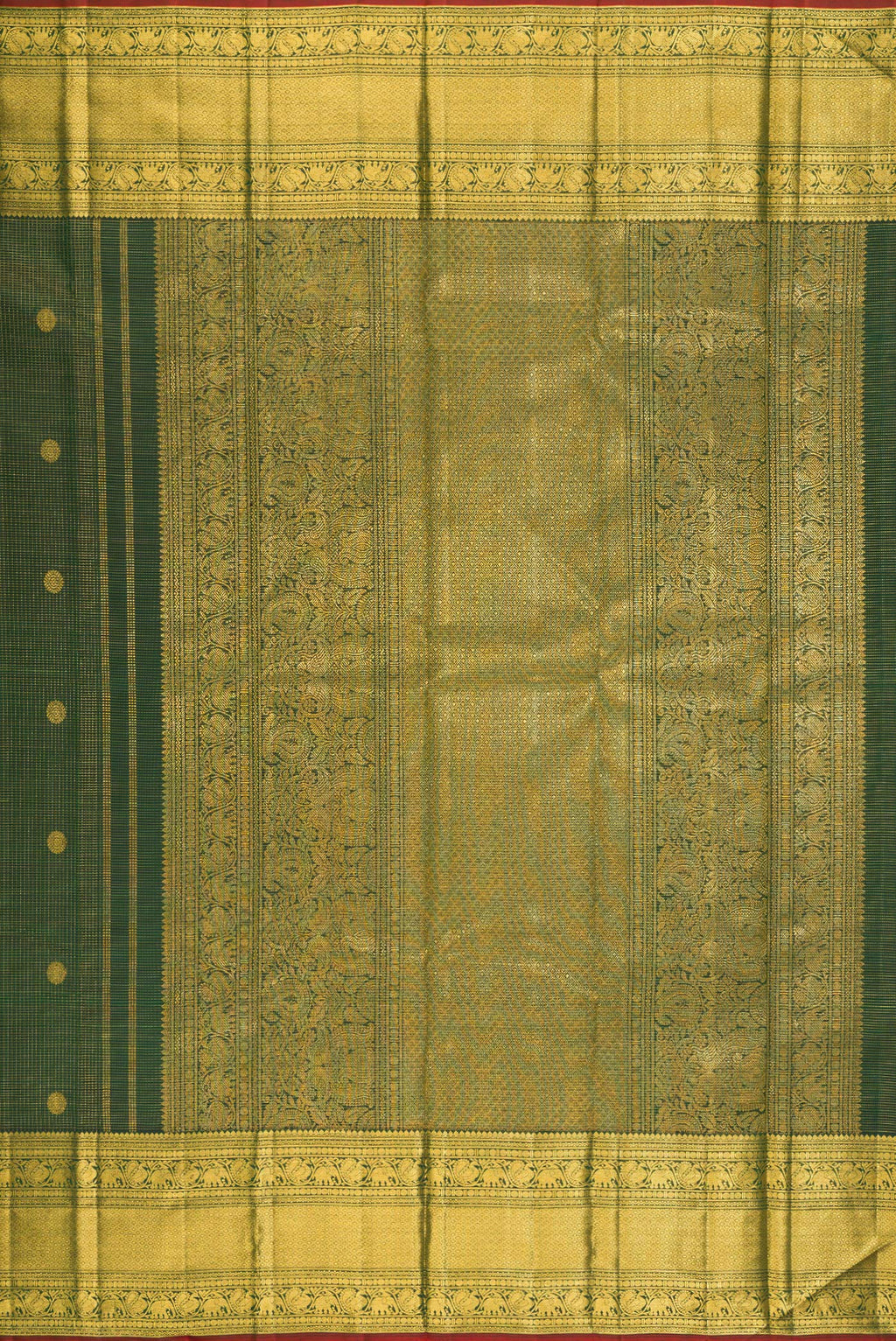 Close up image of the pallu of Bottle Green Kanchipuram Silk Saree with Zari Butta on the body and Zari Border. 