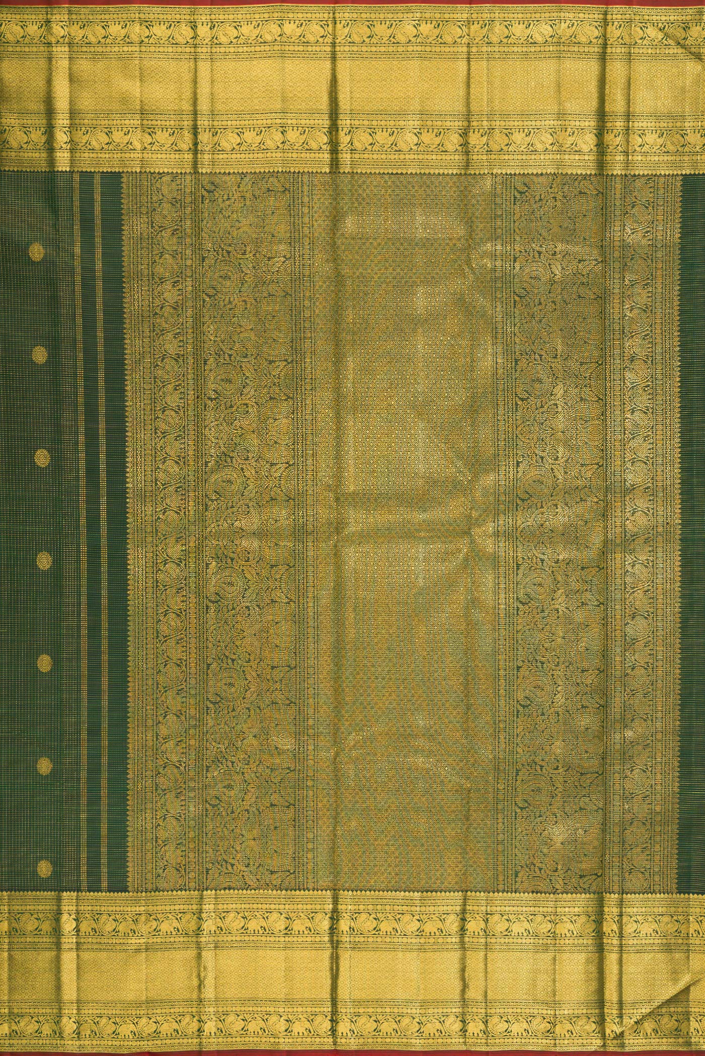 Close up image of the pallu of Bottle Green Kanchipuram Silk Saree with Zari Butta on the body and Zari Border. 