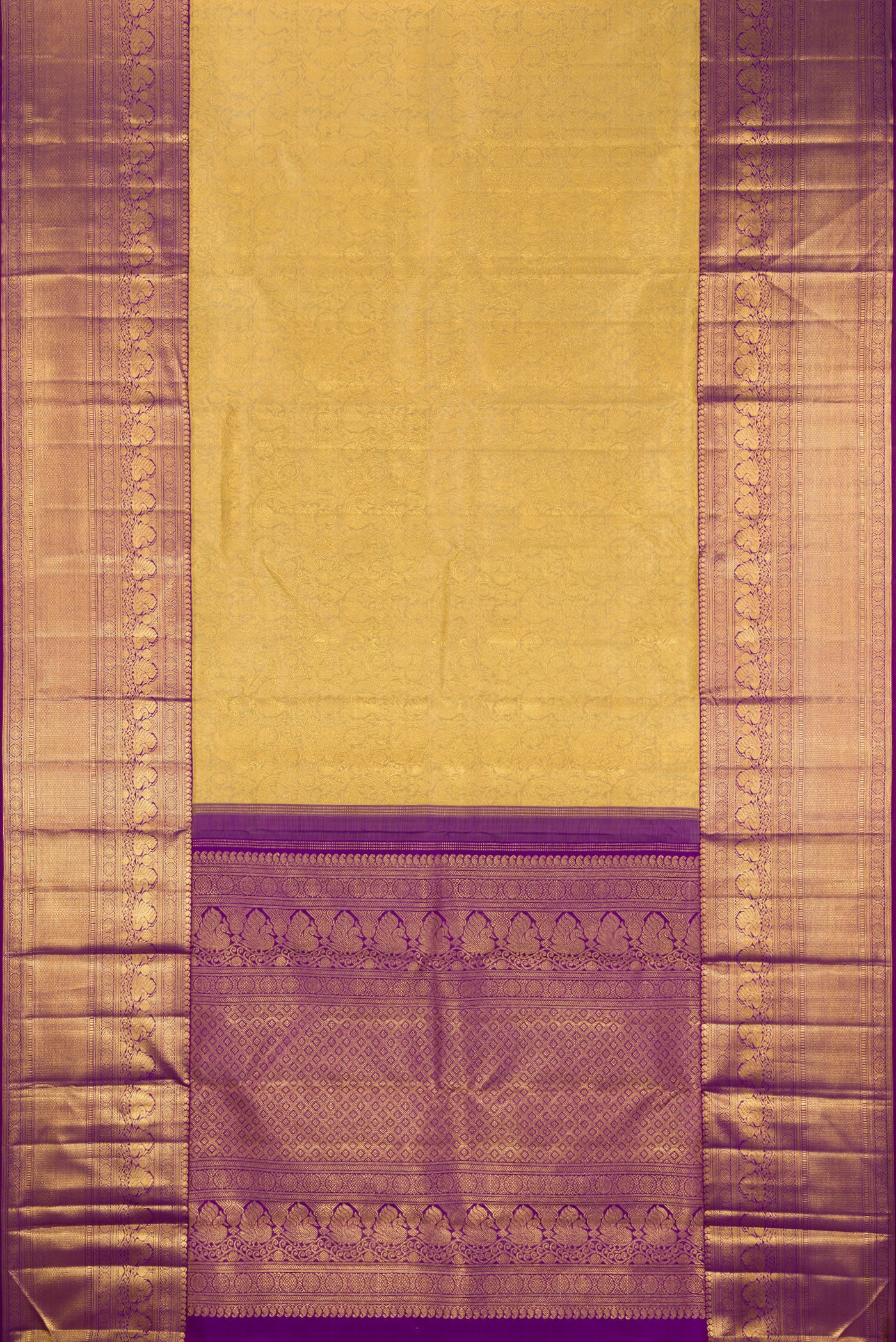 Flat view of Gold Kanchipuram Silk Saree with Zari Brocade on the body and Zari Border. 