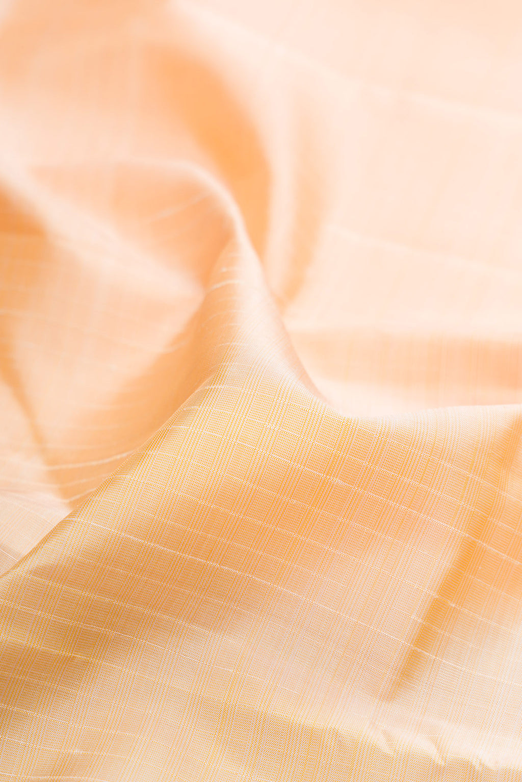 Close up of Sandal Kanjivaram Silk Saree with Checked design on the body and Fancy Border.  displaying folds